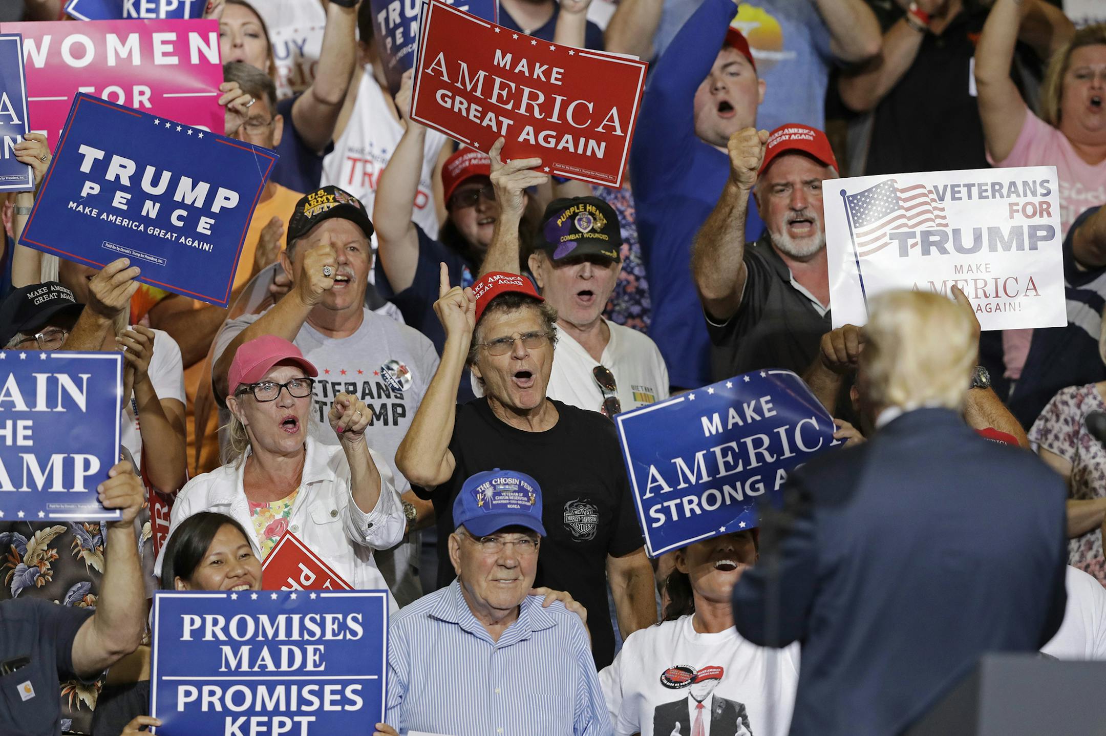 Supporters cheers for President Donald Trump as he speaks during a rally Thursday, Aug. 3, 2017, in Huntington, W.Va. (AP Photo/Darron Cummings) ORG XMIT: MIN2017080417483121