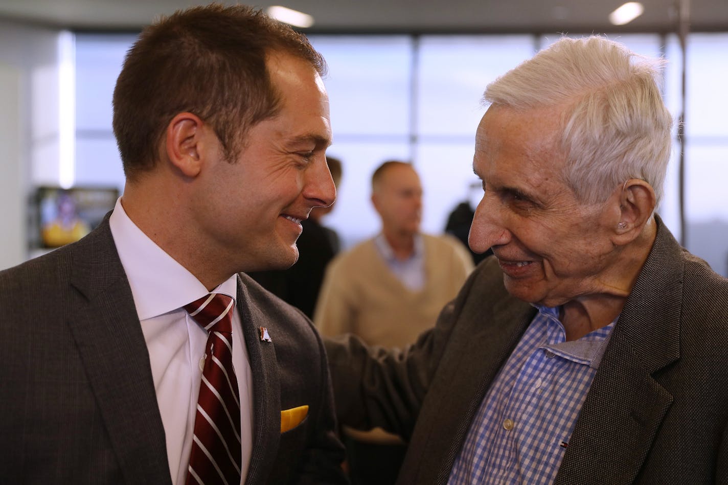 Newly named University of Minnesota football coach P.J. Fleck greeted Star Tribune sports columnist Sid Hartman following a press conference Friday.