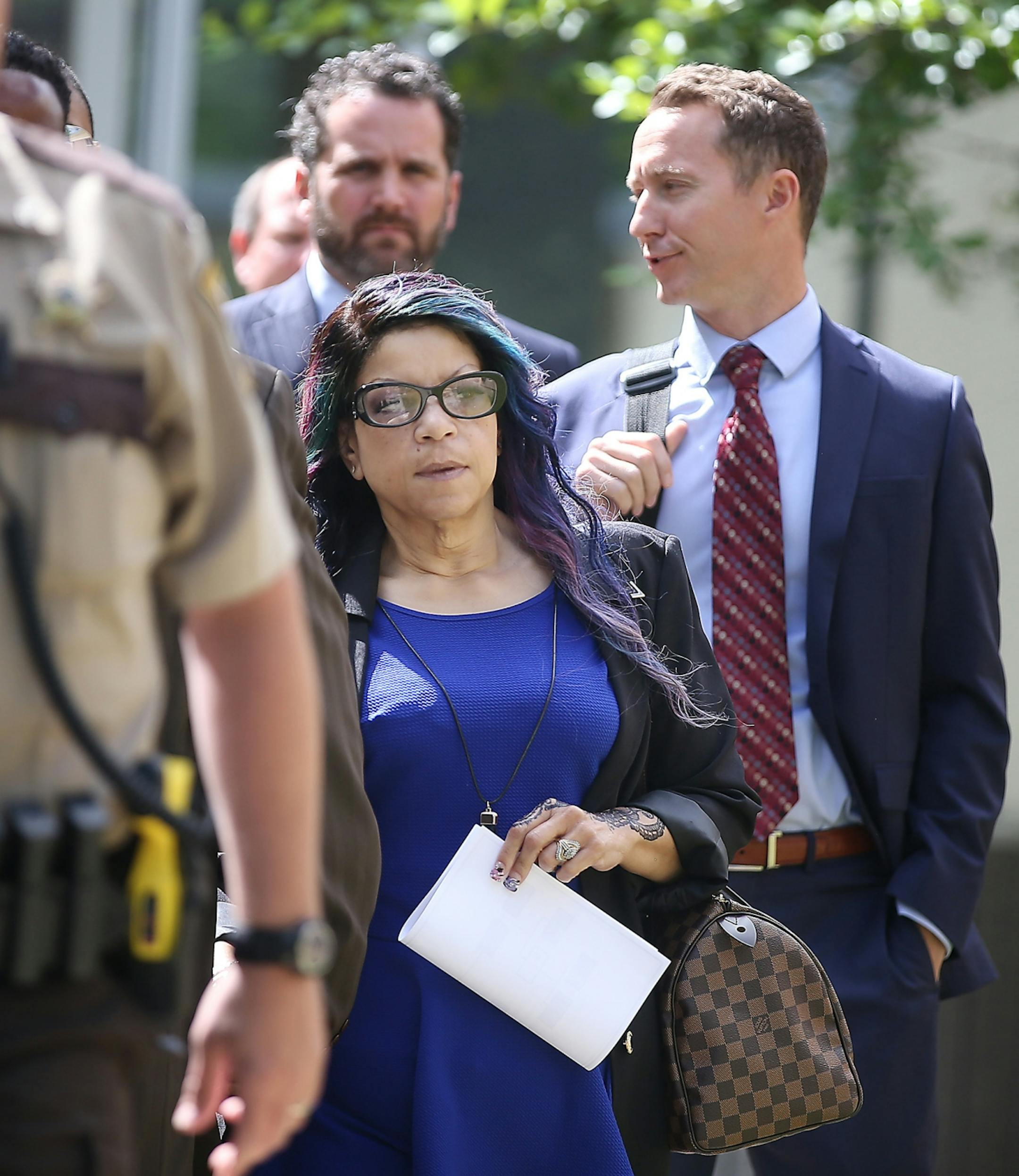 Prince's sister Tyka Nelson made her way out of the Carver County Justice Center on June 27, 2016 in Chaska, MN. Attorneys representing the potential heirs to Prince's estate met in court to discuss issues related to DNA testing of those making a claim to the late musician's music and millions.