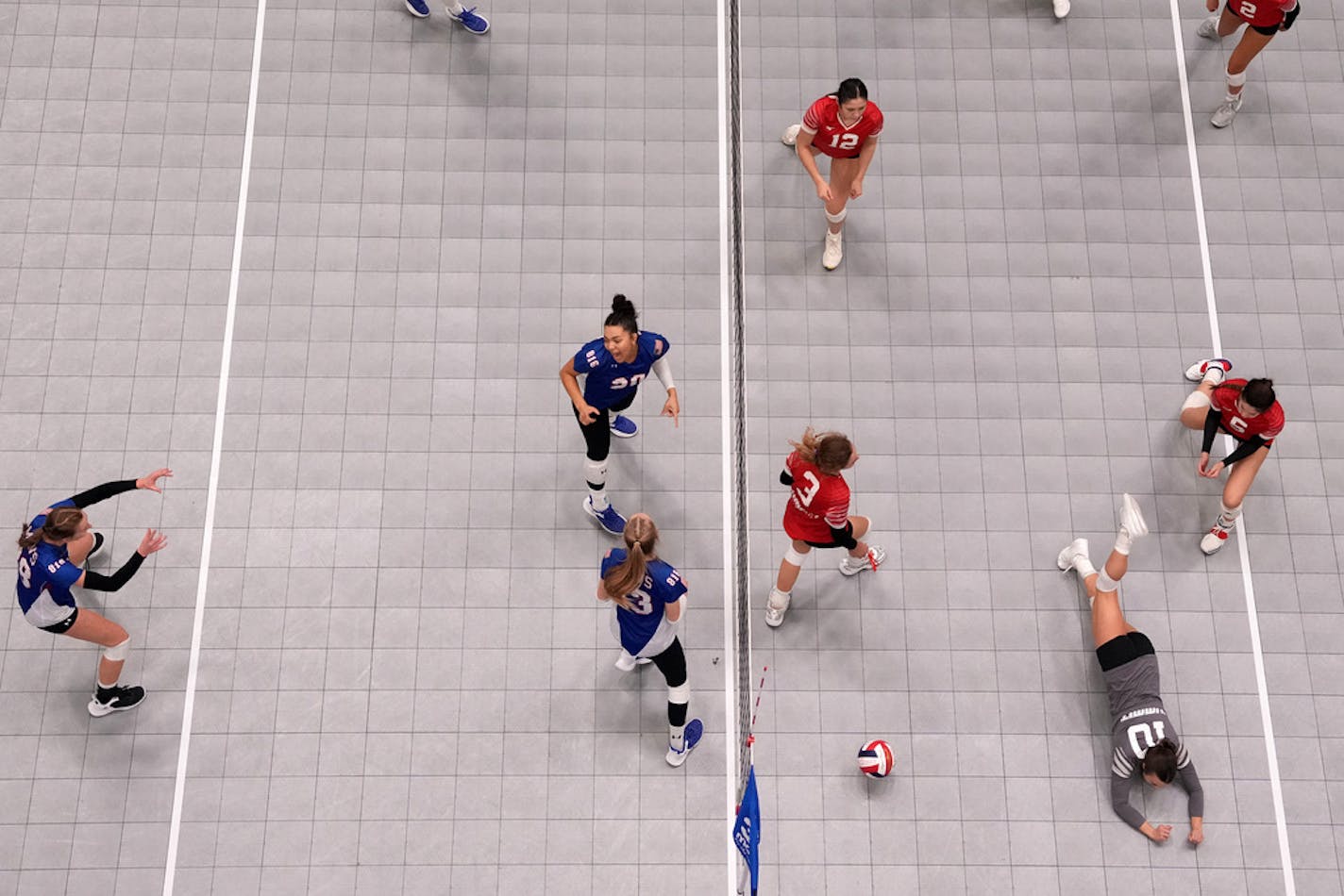 Volleyball teams from across the country compete on multiple courts simultaneously during the Northern Lights Qualifier, a tournament for teams trying to qualify for the national championships, Friday, Jan. 27, 2023 at the Minneapolis Convention Center in Minneapolis. ] ANTHONY SOUFFLE • anthony.souffle@startribune.com