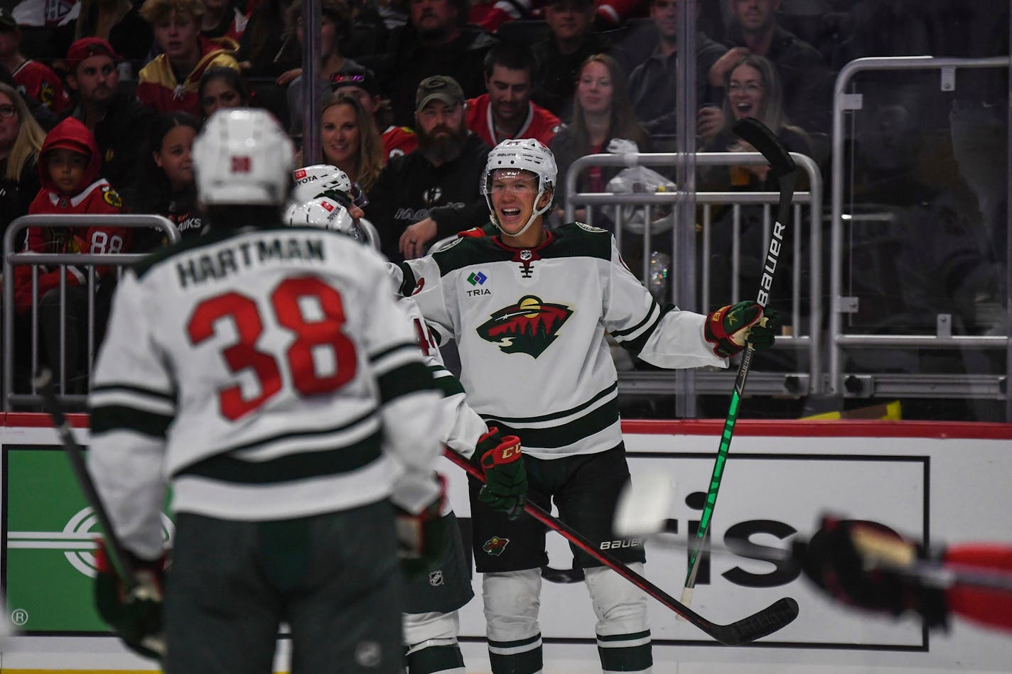 Minnesota Wild' Matt Boldy celebrates his goal during the third period of a preseason NHL hockey game against the Chicago Blackhawks, Sunday, Oct. 2, 2022, in Milwaukee. (AP Photo/Kenny Yoo)