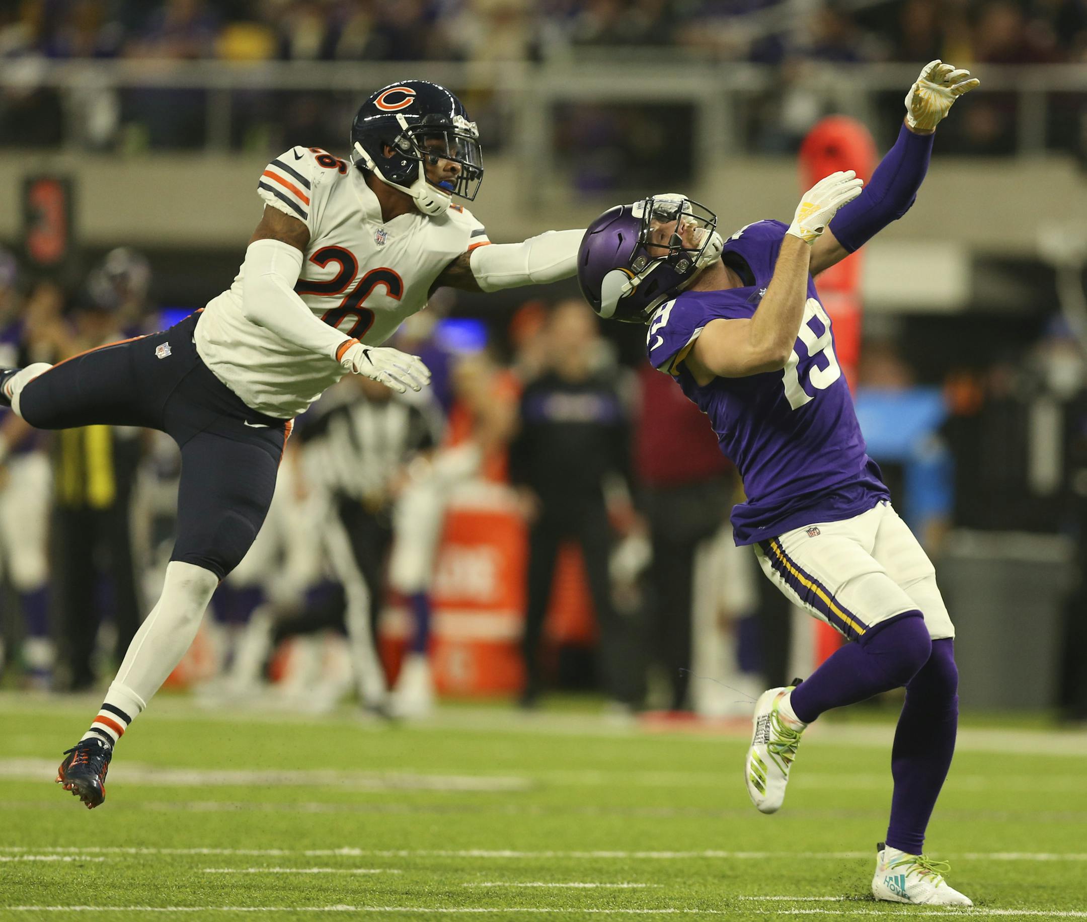 Chicago Bears defensive back Deon Bush (26) was called for a facemask penalty on Minnesota Vikings wide receiver Adam Thielen (19), helping set up a late second quarter field goal. ] JEFF WHEELER • jeff.wheeler@startribune.com The Minnesota Vikings faced the Chicago Bears in an NFL football game Sunday afternoon, December 30, 2018 at U.S. Bank Stadium in Minneapolis.