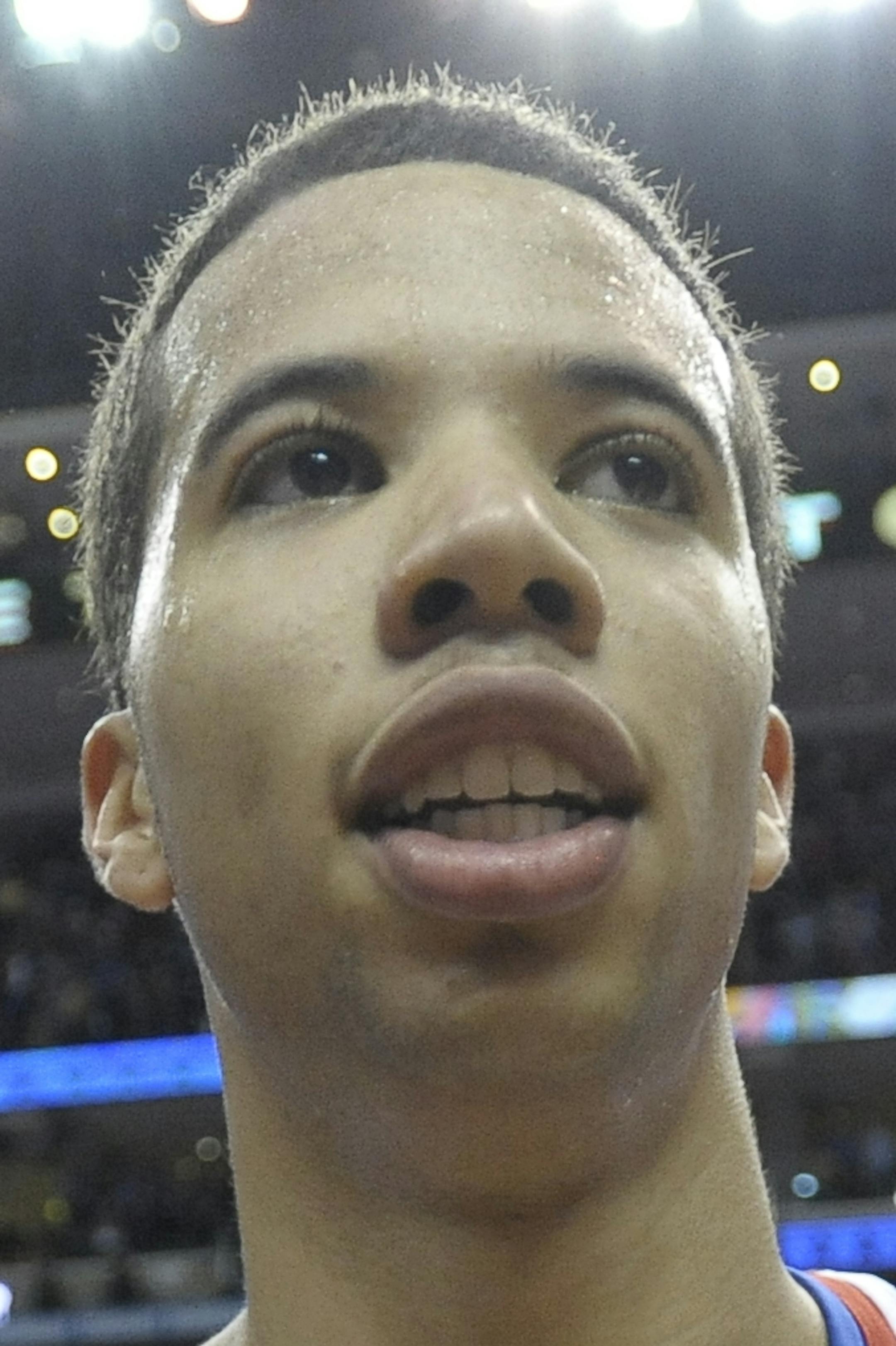 Philadelphia 76ers' Michael Carter-Williams (1) is seen during the second half of an NBA basketball game against the Miami Heat on Wednesday, Oct. 30, 2013, in Philadelphia. (AP Photo/Michael Perez)