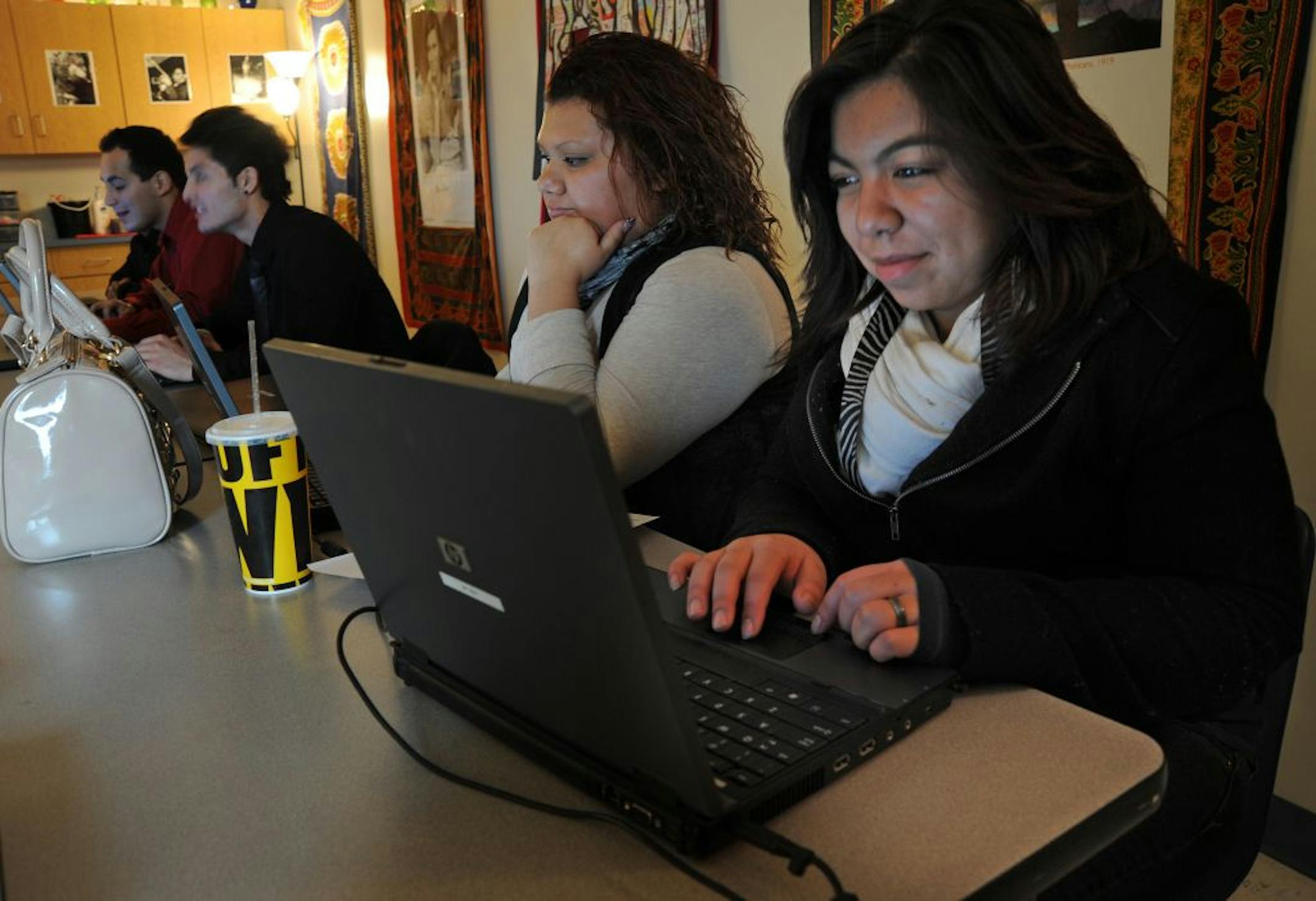Seeing a disconnect at their alternative high school between 9th and 10th graders and the growing numbers of 18-21-year-olds, the Anoka-Hennepin School District created Crossroads West Alternative School for the oldest students. The school is located in Champlin, in a strip mall. From left to right Cynthia Aguero 19 years old and Veronica Cabera worked on their computers in their, class called on course which prepares them for college level courses.
