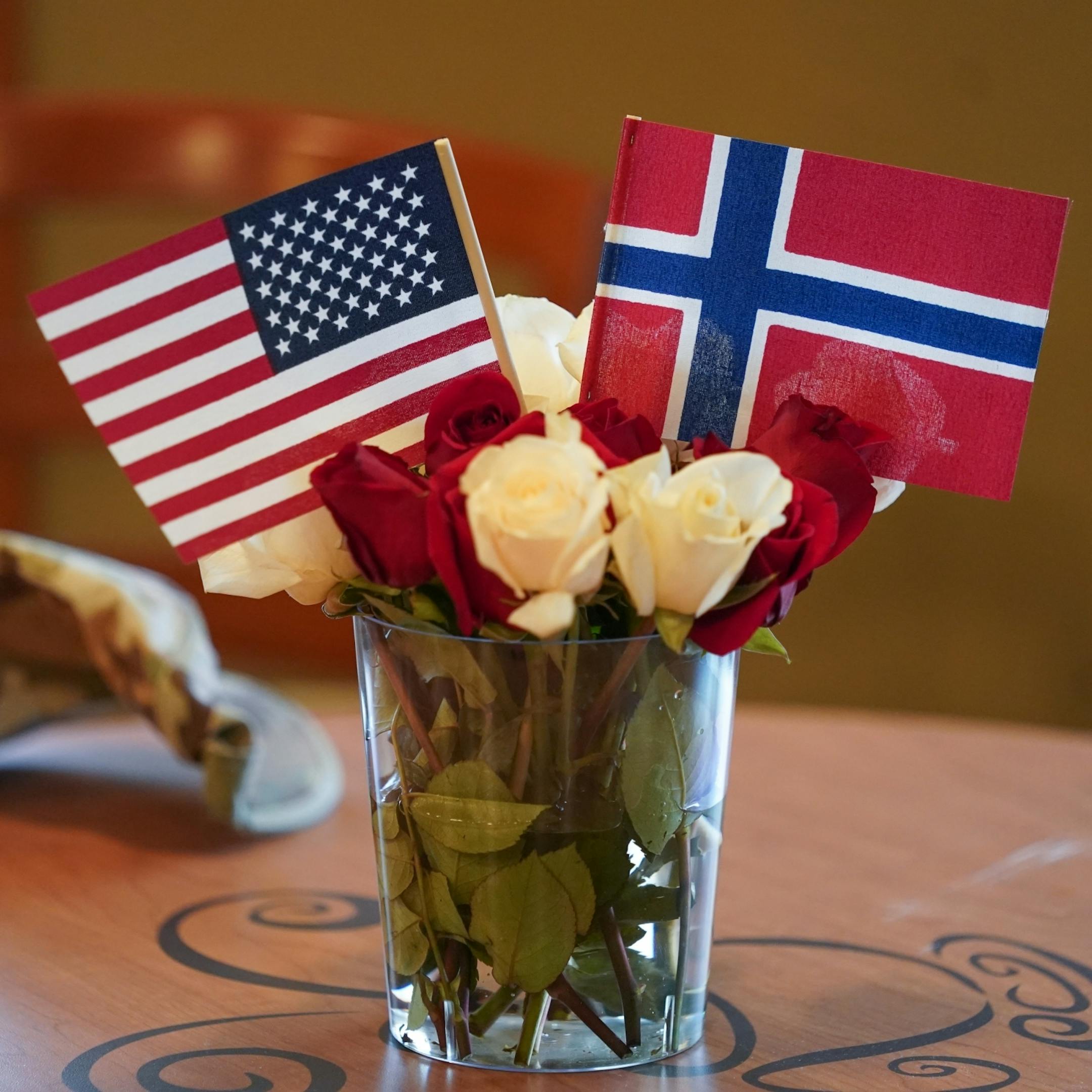 Norwegian and U.S. flags decorated the room. Norwegian Ambassador Kåre R. Aas presented two medals to 100-year-old Wilton Rasmusson, who served under the Office of Strategic Services' Norwegian Operational Unit, NORSO II, during World War II.