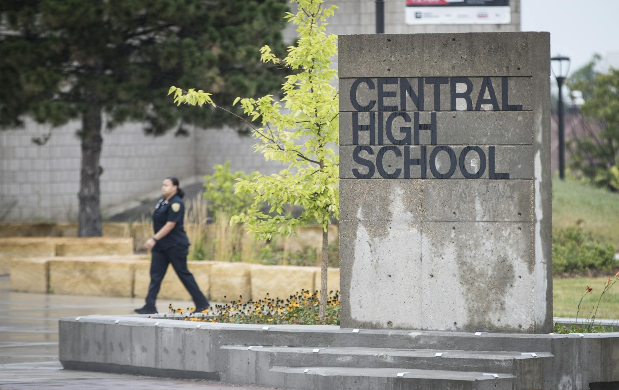 A security officer walked in front of Central High School after a lockdown ended on Monday, September 18, 2017, St. Paul, Minn.
