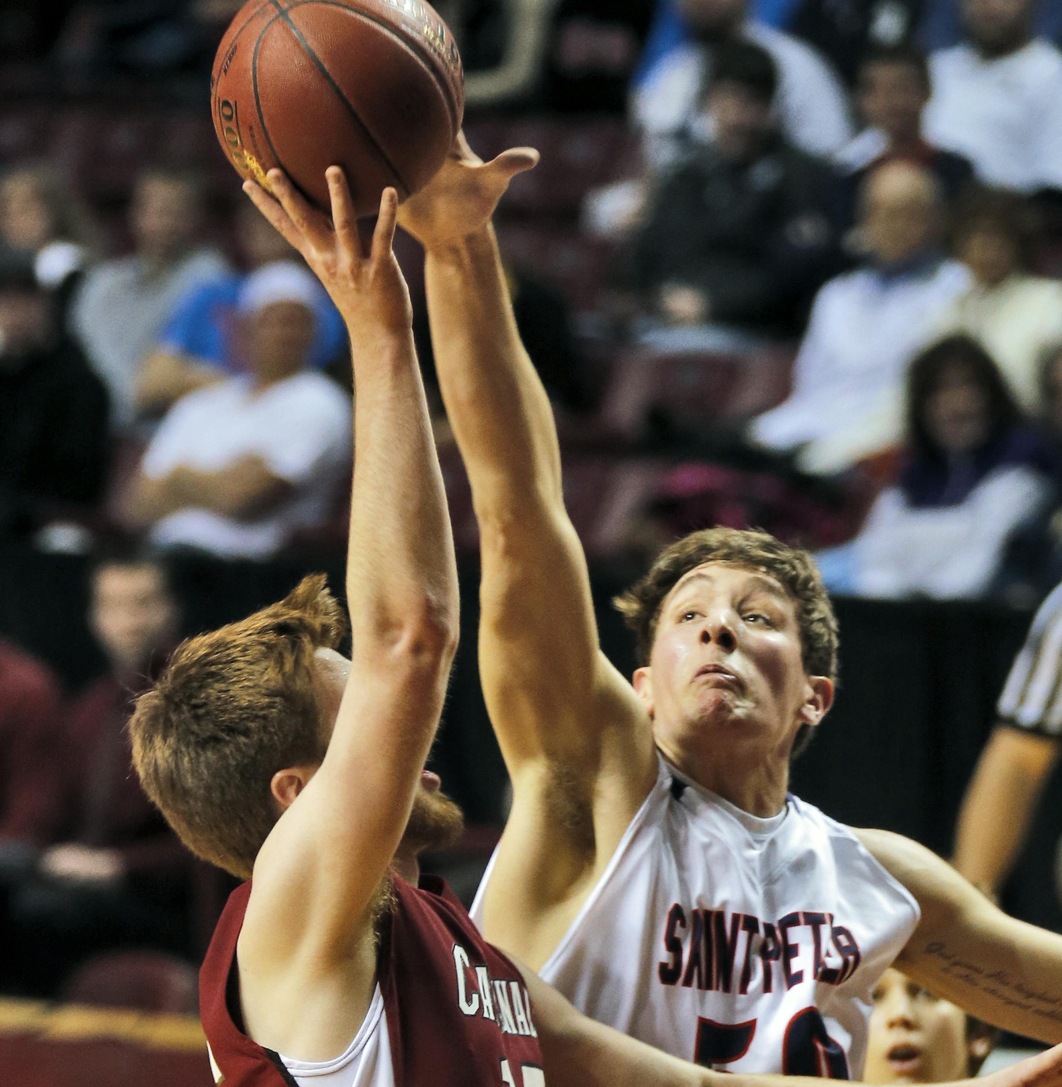 St. Peter's Kolin Bartlett (50) blocked the shot of Fairmont's Luke Peterson (15). ] Boys Basketball State Tournament. Class 2A Fairmont Cardinals vs. St. Peter Saints. (MARLIN LEVISON/STARTRIBUNE(mlevison@startribune.com)