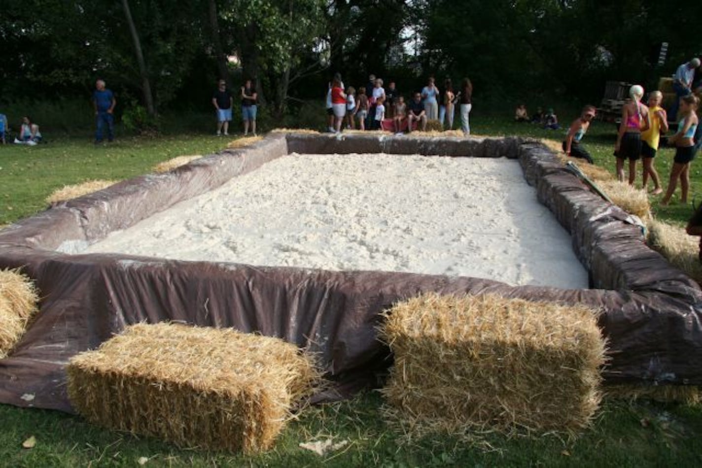 Barnesville, in western Minnesota, fills a 20-by-20-foot mashed-potato wrestling pit for its Potato Days celebration.