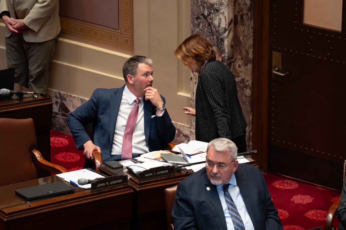 Senate Minority Leader Mark Johnson, R-East Grand Forks, and Senate Majority Leader Erin Murphy, DFL-St. Paul, exchange some heated words over the pac
