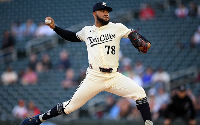 Minnesota Twins pitcher Simeon Woods Richardson throws a pitch against the Seattle Mariners in the top of the first inning Monday night at Target Fiel