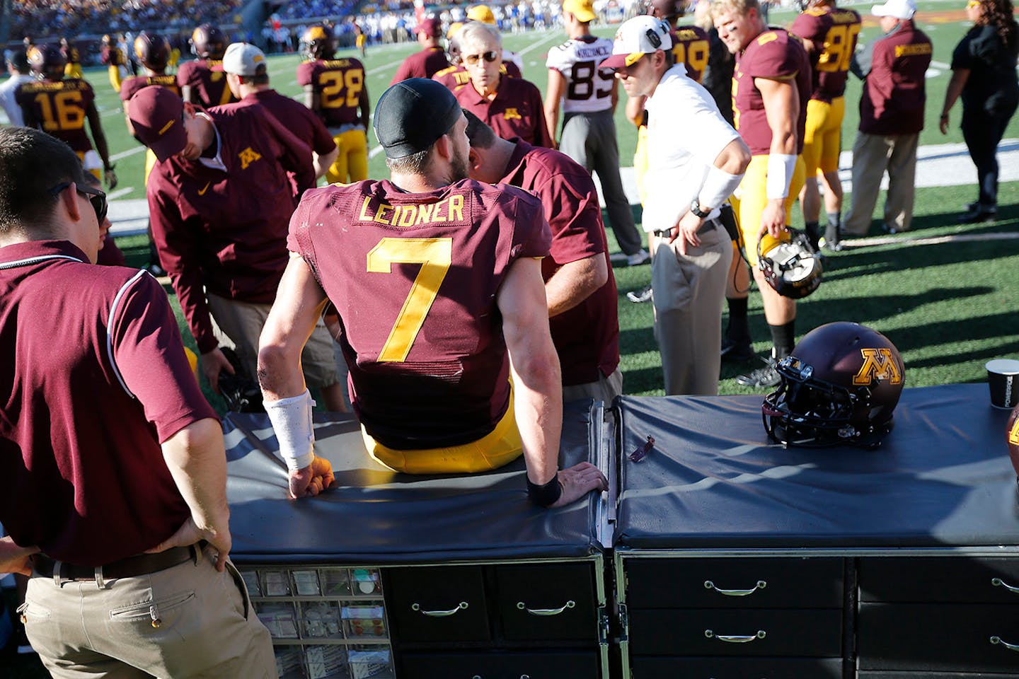 Minnesota staff worked on Minnesota sophomore quarterback Mitch Leidner's knee injury in the third quarter Saturday.