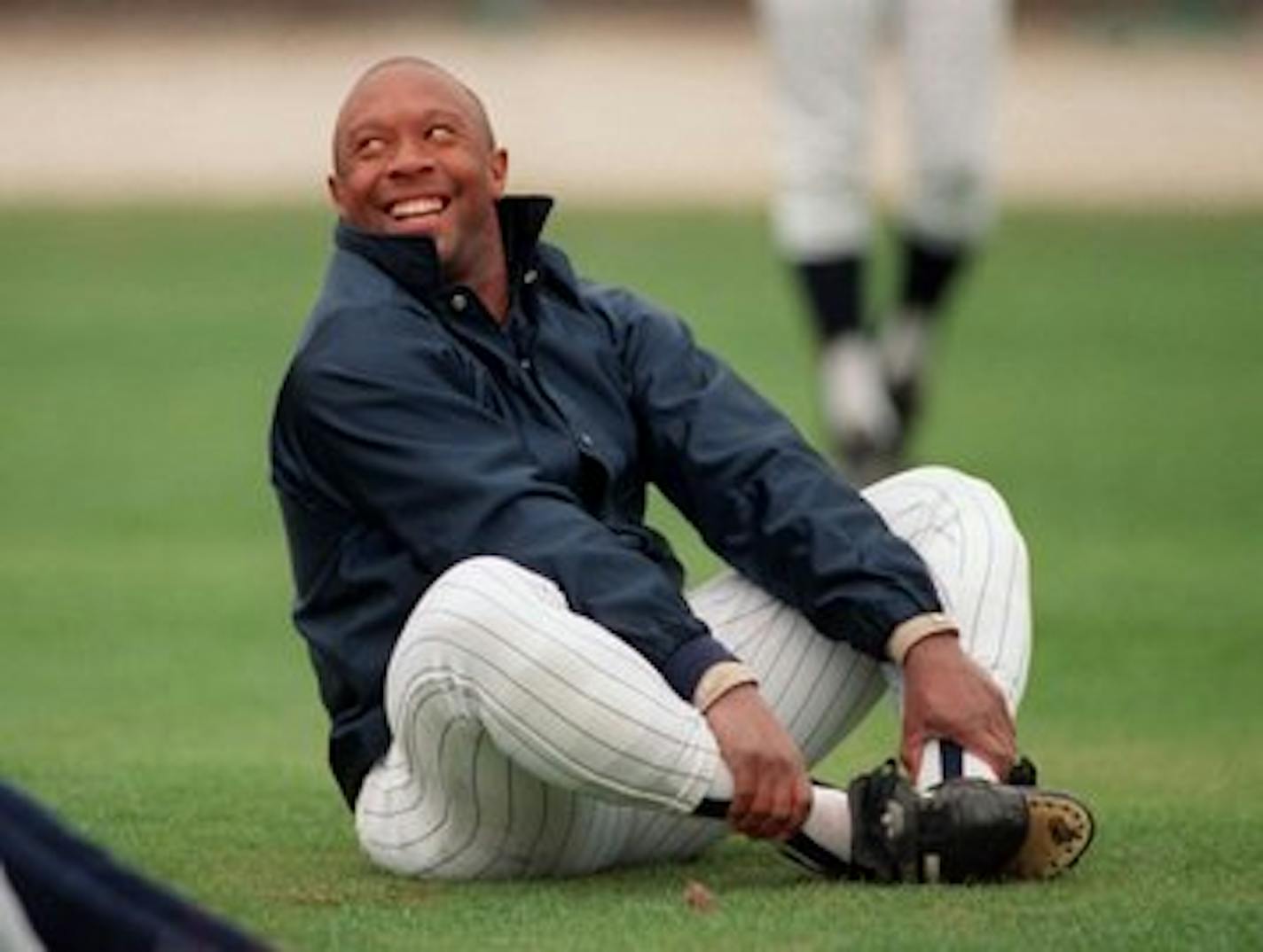 Minnesota Twins baseball star Kirby Puckett laughs at a joke by the Twins' Al Newman (not shown) during spring training 1989. It was "jacket weather" in Florida with temps in the low forties. Star Tribune staff photo February 23, 1989, by Brian Peterson.