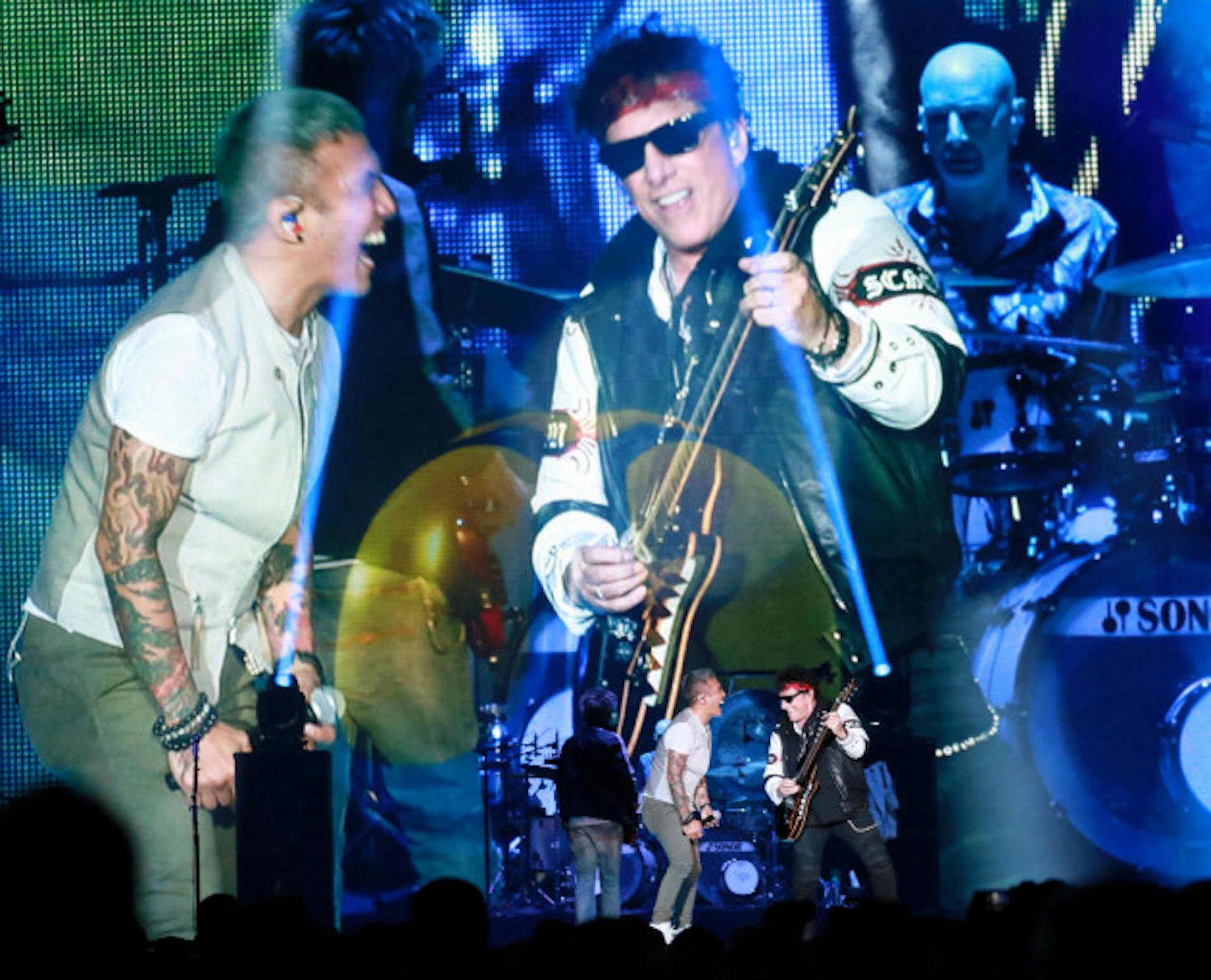Arnel Pineda and Neal Schon loomed large on the big screen when Journey played Target Field in 2018. / David Joles, Star Tribune