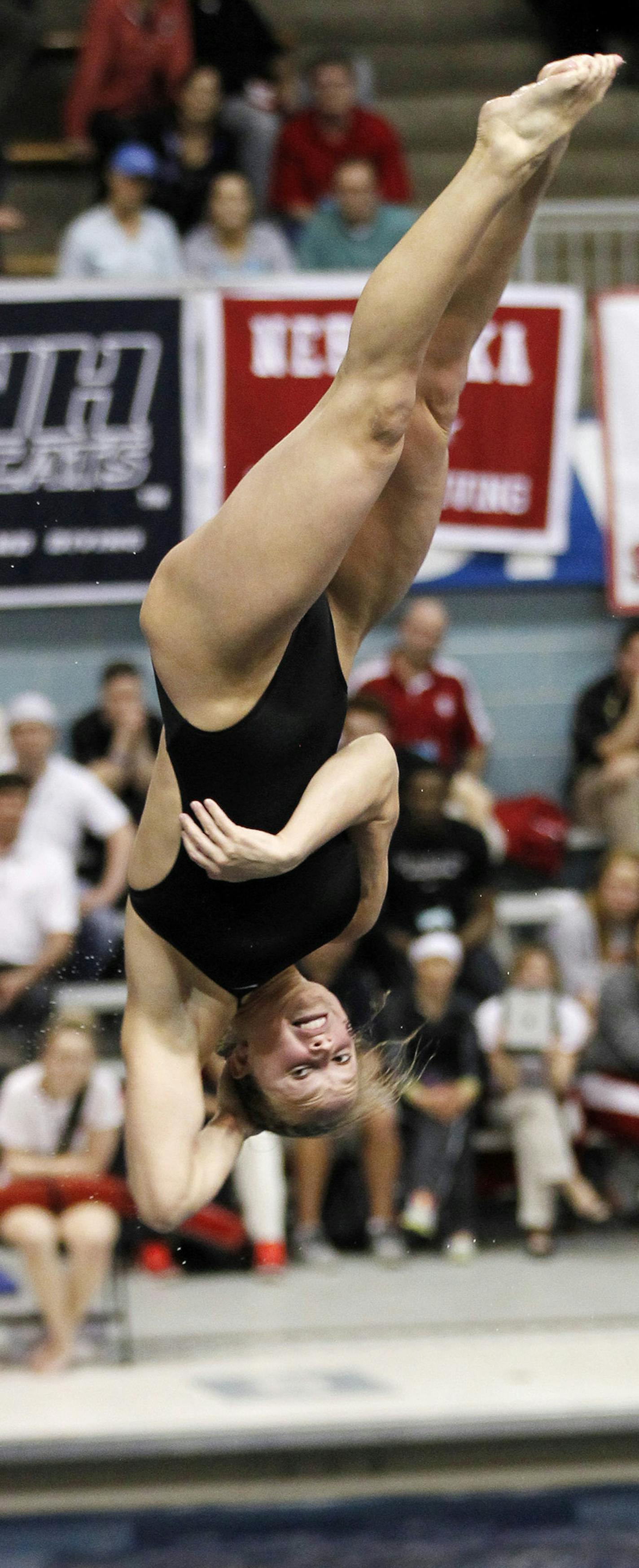 Georgia's Laura Ryan competes in 3-meter diving at he NCAA women's swimming and diving championships in Minneapolis, Friday, March 21, 2014. (AP Photo/Andy Clayton-King)