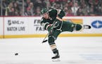 Minnesota Wild defenseman Jared Spurgeon (46) cleared the puck towards into Columbus' zone in the first period Saturday.