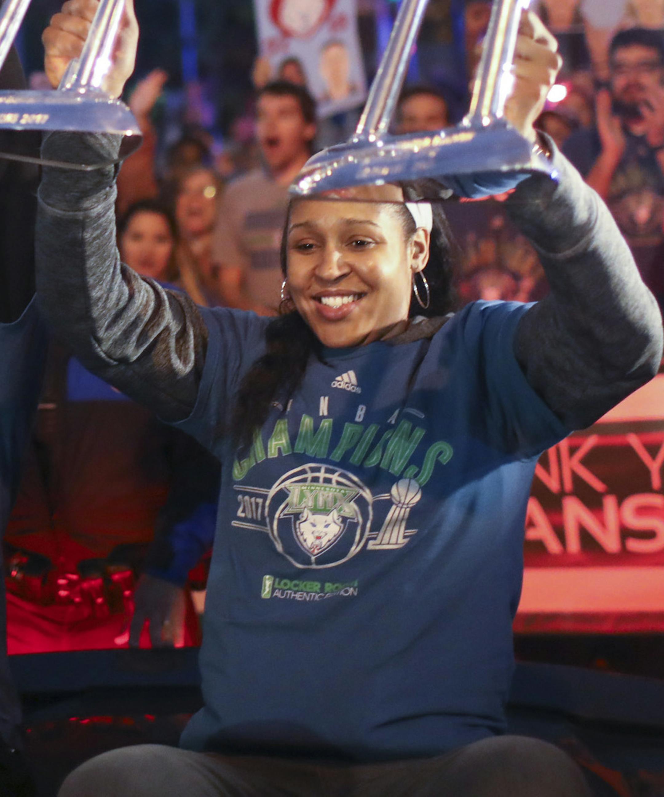 Minnesota Lynx players Sylvia Fowles, left and Maya Moore held up all four WNBA Championship trophies as they arrived at Williams Arena for the celebration Thursday night. ] JEFF WHEELER &#xef; jeff.wheeler@startribune.com The Minnesota Lynx celebrated their fourth WNBA championship with a parade on University Ave. culminating with a rally at Williams Arena Thursday night, October 5, 2017 in Minneapolis.