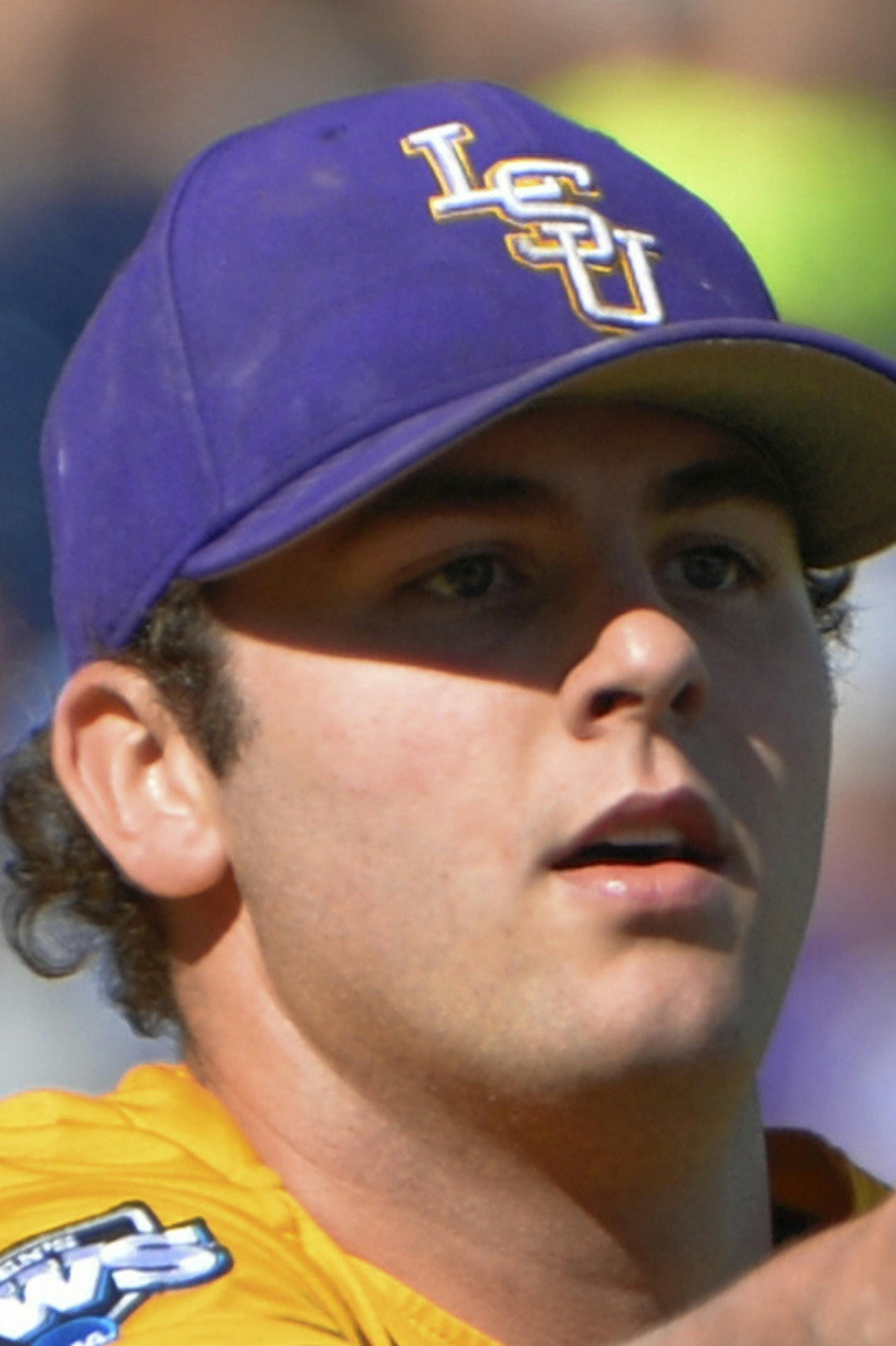 LSU pitcher Alex Lange throws out Cal State Fullerton's Timmy Richards in the ninth inning of an NCAA College World Series baseball elimination game in Omaha, Neb., Tuesday, June 16, 2015. LSU won 5-3. (AP Photo/Ted Kirk)