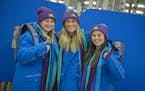 University of Minnesota-Mankato students from left, Cassie Evans, Kelsey Little, and Amanda Haupert, tried on the gear that they received and will be 