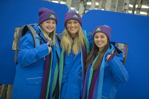 University of Minnesota-Mankato students from left, Cassie Evans, Kelsey Little, and Amanda Haupert, tried on the gear that they received and will be 