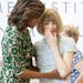 First lady Michelle Obama, left, hugs fashion icon Anna Wintour at the dedication ceremony for the newly renamed Anna Wintour Costume Center at the Me
