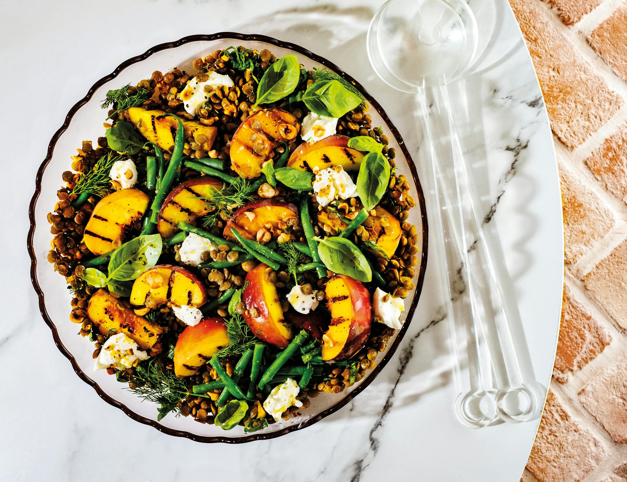 Grilled Peach, Goat Cheese and Lentil Salad is the perfect combination of sweet and salty. From "Flavor Kitchen" by Crystelle Pereira, Kyle Books. Photo: Vanessa Lewis