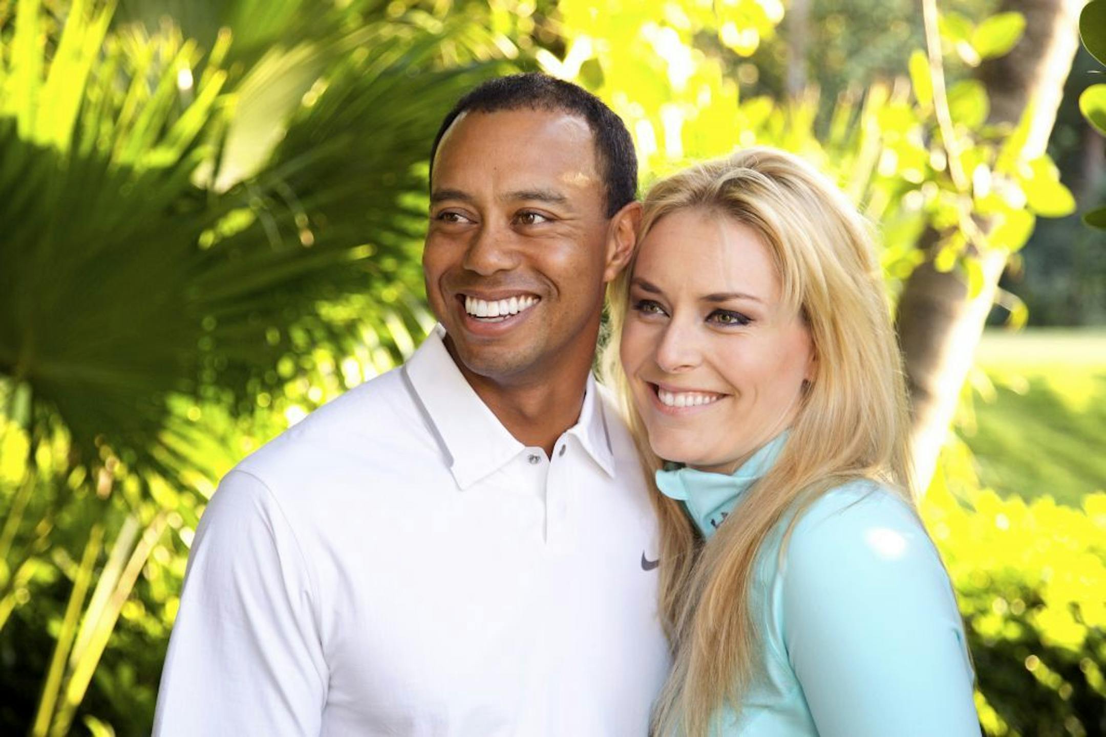 In this 2013 photo provided by Tiger Woods and Lindsey Vonn, golfer Tiger Woods and skier Lindsey Vonn pose for a portrait. Two months after rumors began circulating in Europe, Woods and Vonn posted separate items on their Facebook pages Monday, March 18, 2013, to announce their relationship. (AP Photo/Courtesy Tiger Woods/Lindsey Vonn) MANDATORY CREDIT TO COURTESY TIGER WOODS/LINDSEY VONN