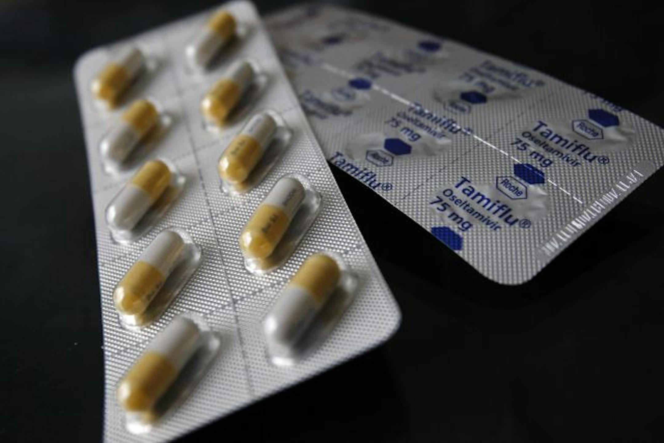 Packets of anti-viral drug, Tamiflu are seen, London, Monday, April 27, 2009. The British government is preparing for a possible swine flu outbreak in the UK and says it has enough flu drugs to treat one in two people, amid global fears of a possible swine flu pandemic following the deadly outbreak in Mexico.