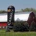 This July 2010 photo shows a silo along Highway 169 between St. Peter and Le Sueur, Minn. bearing the logo for countertop manufacturer Cambria. Almost