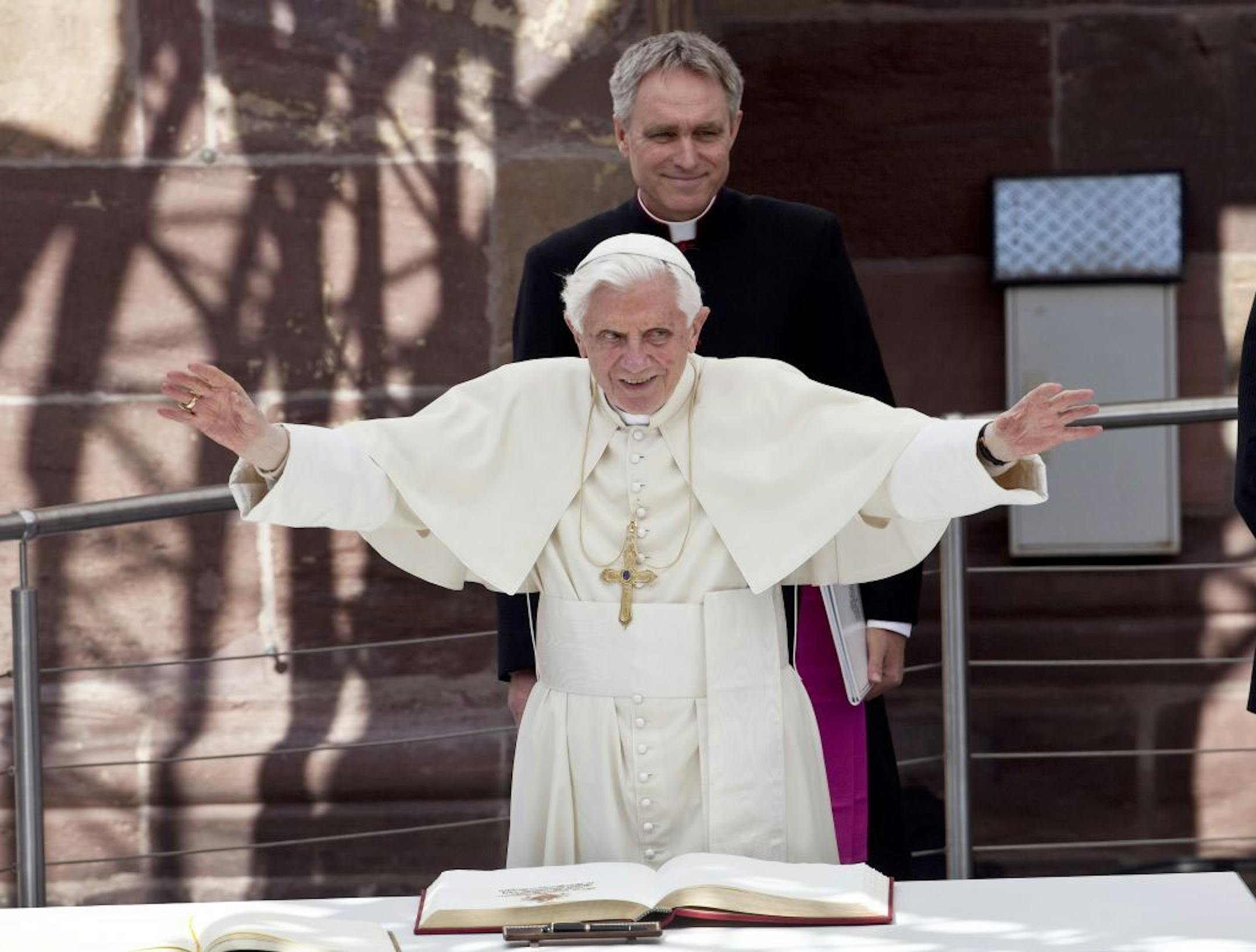 Pope Benedict XVI greets faithful outside Freiburger Cathedral (Freiburg Minster) in the southwestern German town of Freiburg Saturday, Sept. 24, 2011. Pope Benedict is on a four-day official visit to his homeland Germany.