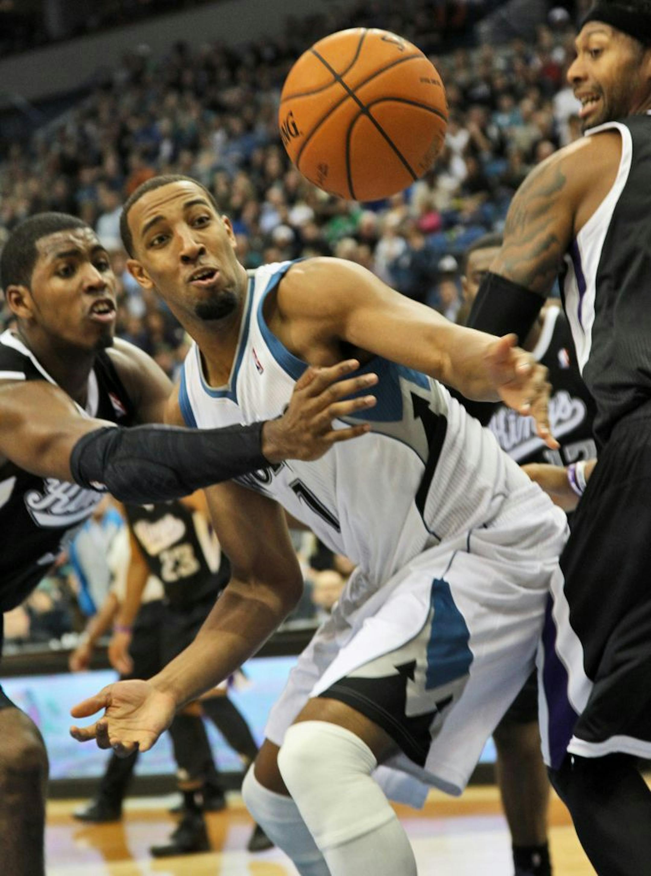 Derrick Williams fights for control of a lose ball.