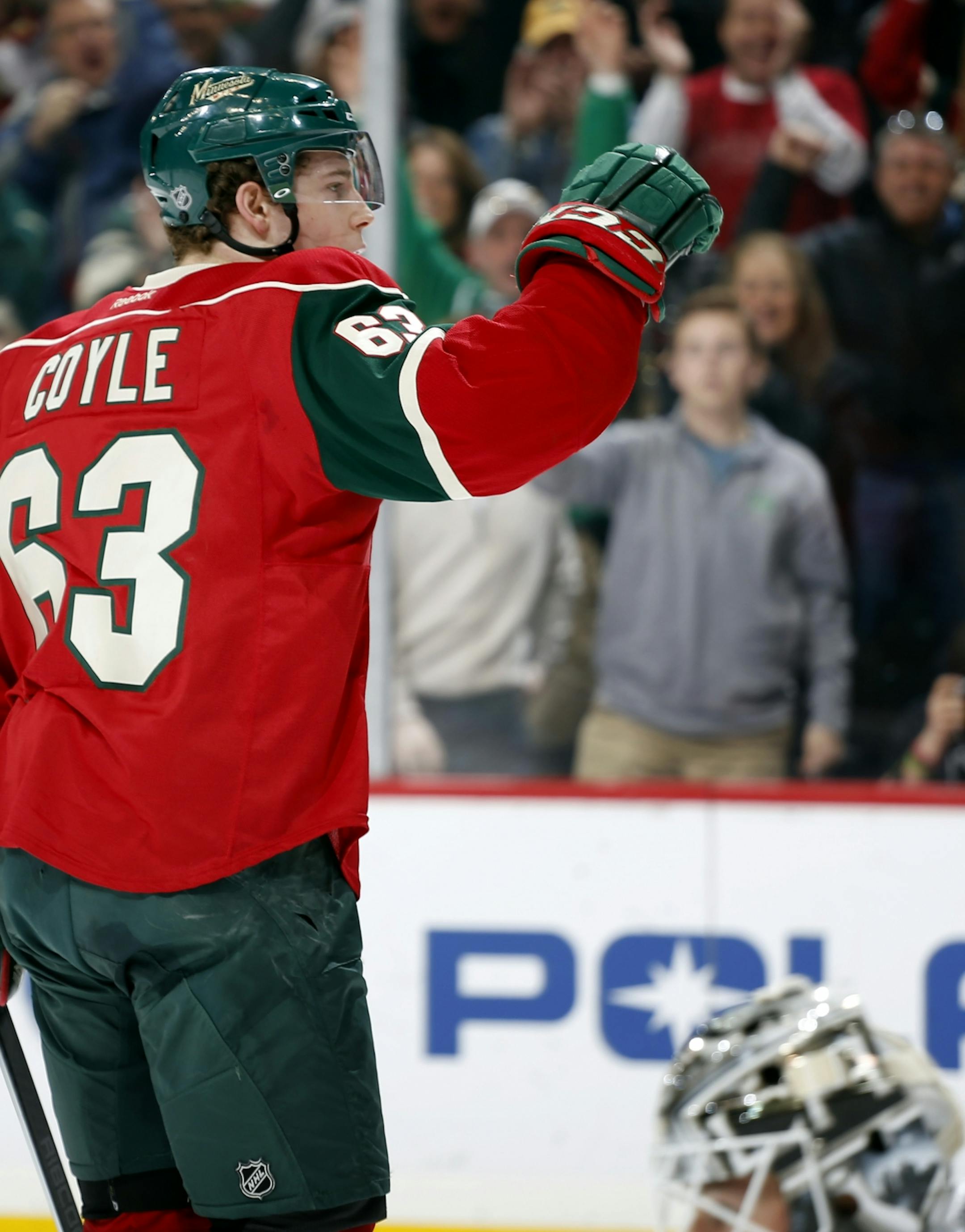 Charlie Coyle (63) of the Minnesota Wild celebrated after scoring in the first period.