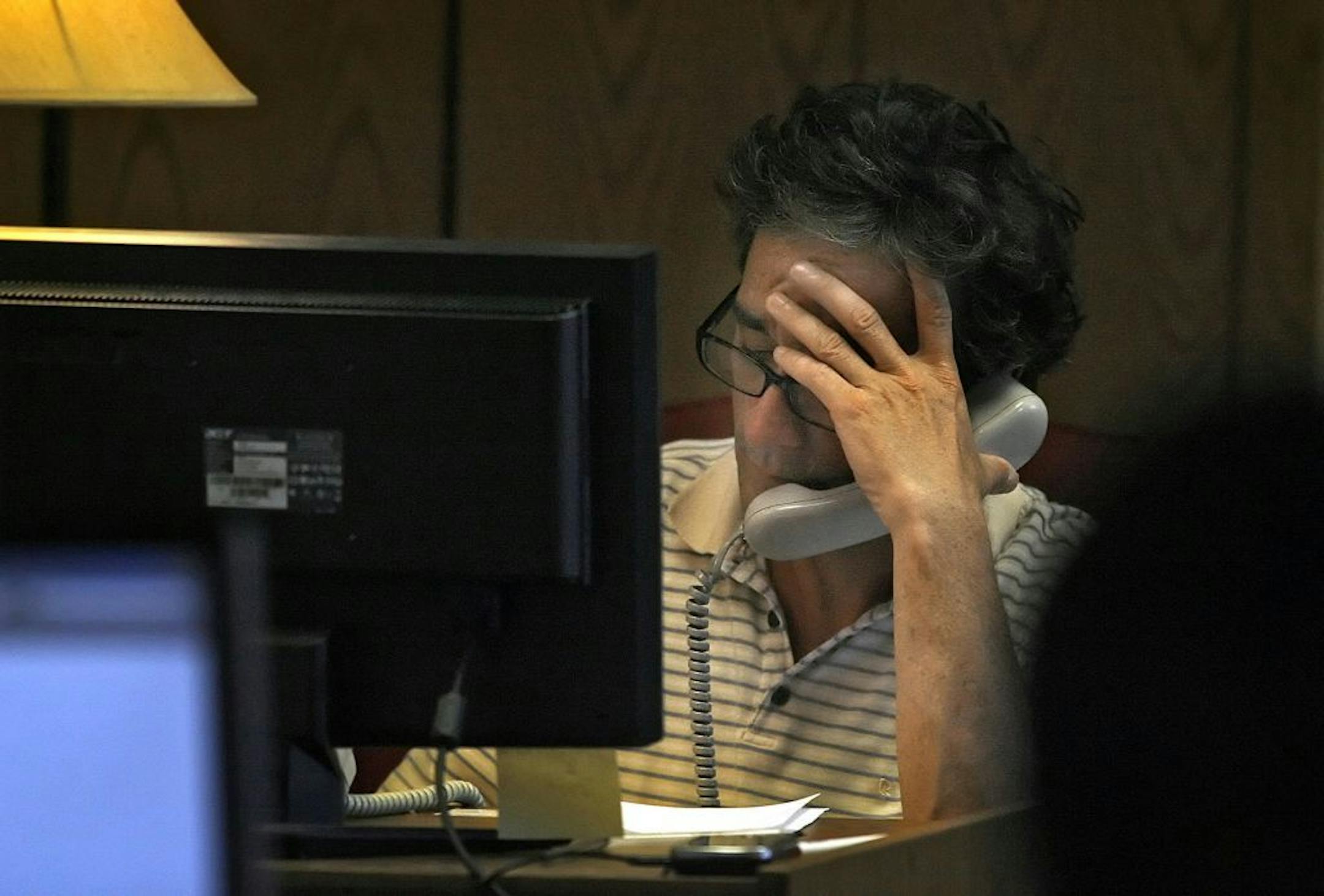 A phone counselor at Crisis Connection talked with a caller.