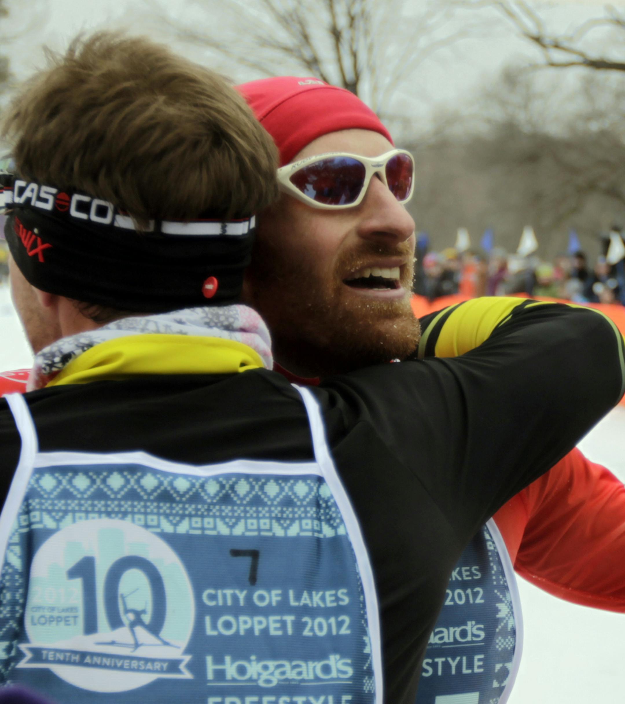 Matt Leibsch left of Long Lake hugged Brian Gregg after Matt fished first and Brian second in Sunday's City of Lakes Loppet at Theodore Wirth Park in Minneapolis, Minnesota .. ] (Jerry Holt/ STAR TRIBUNE/jgholt@startribune.com)