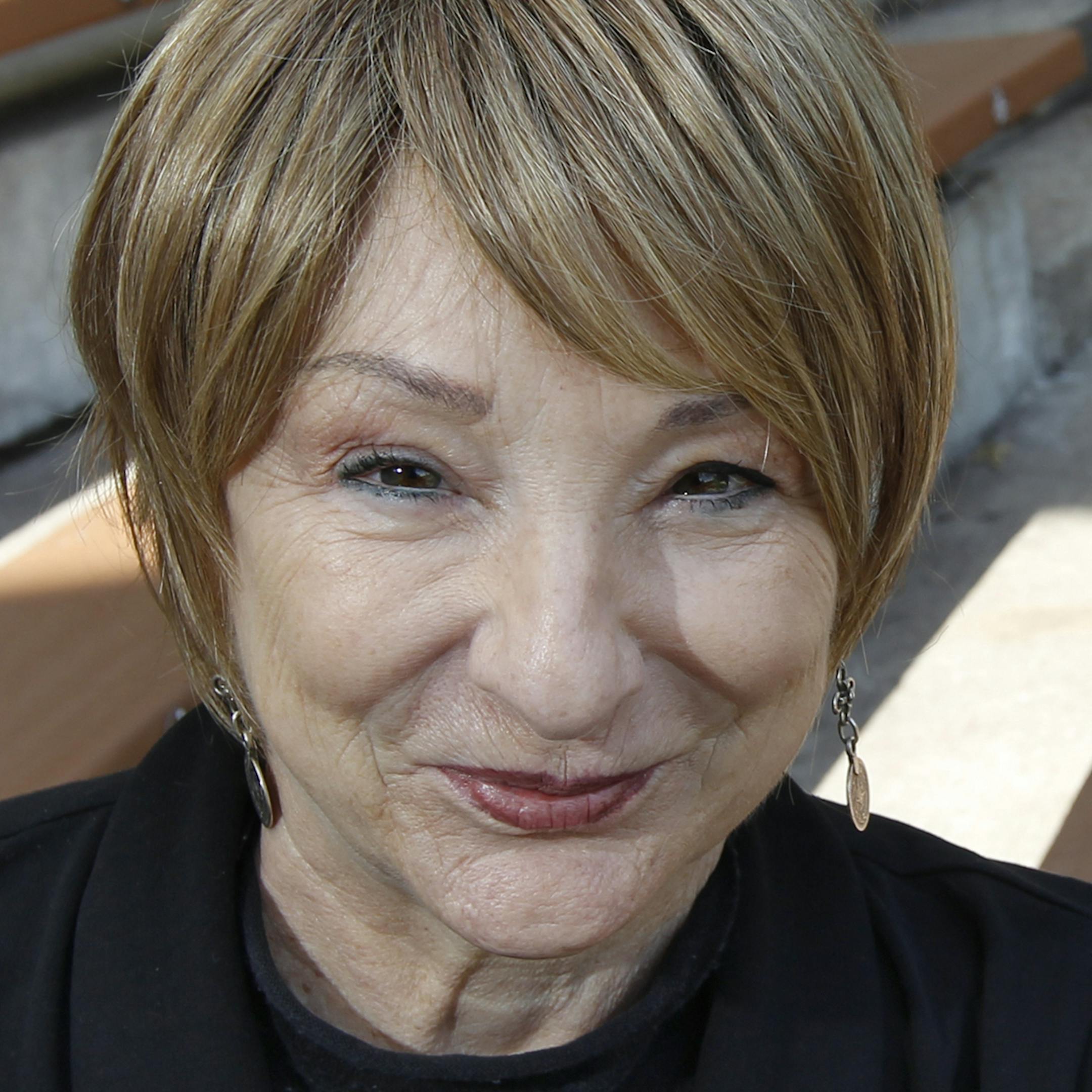 Anything for a photo, The great connection of the Zoo amphitheater and SMA's Sue McLean might be a perfect match. The huge Blue Macaw was part of the bird show that takes place in the concert space during the day.Sue McClean of SMA keep the ball rolling in the Minnesota Music world with over 130 concert events stage each year. Jon Bream writes an in depth profile of the longstanding music promoter, "icon'.[ TOM WALLACE • twallace@startribune.com _ Assignments #20023620A_ June 24, 2012_ SL