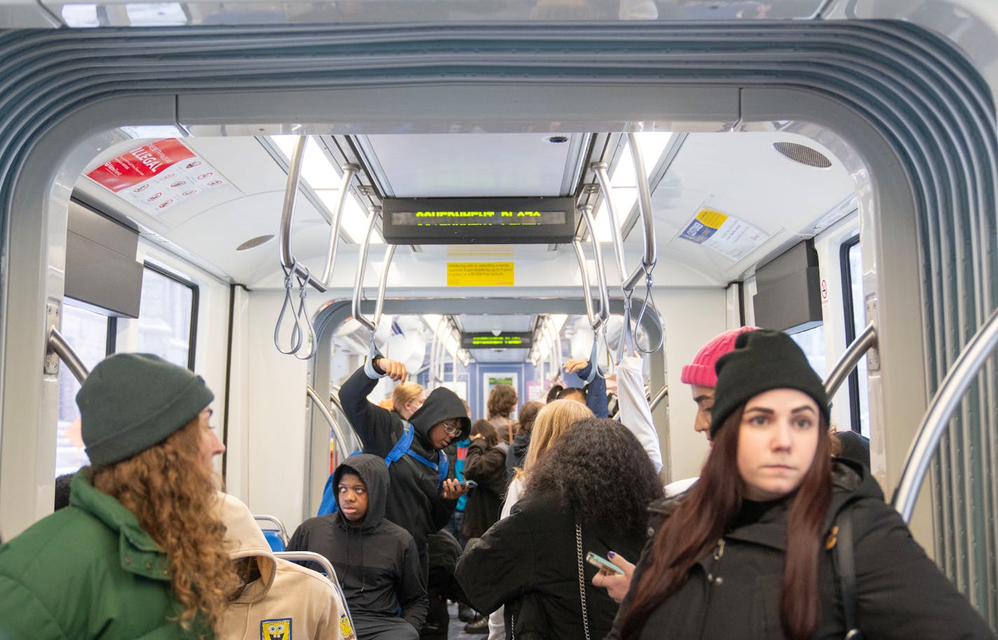 Passengers ride an eastbound light rail train Wednesday, Jan. 25, 2023 in downtown Minneapolis. ]