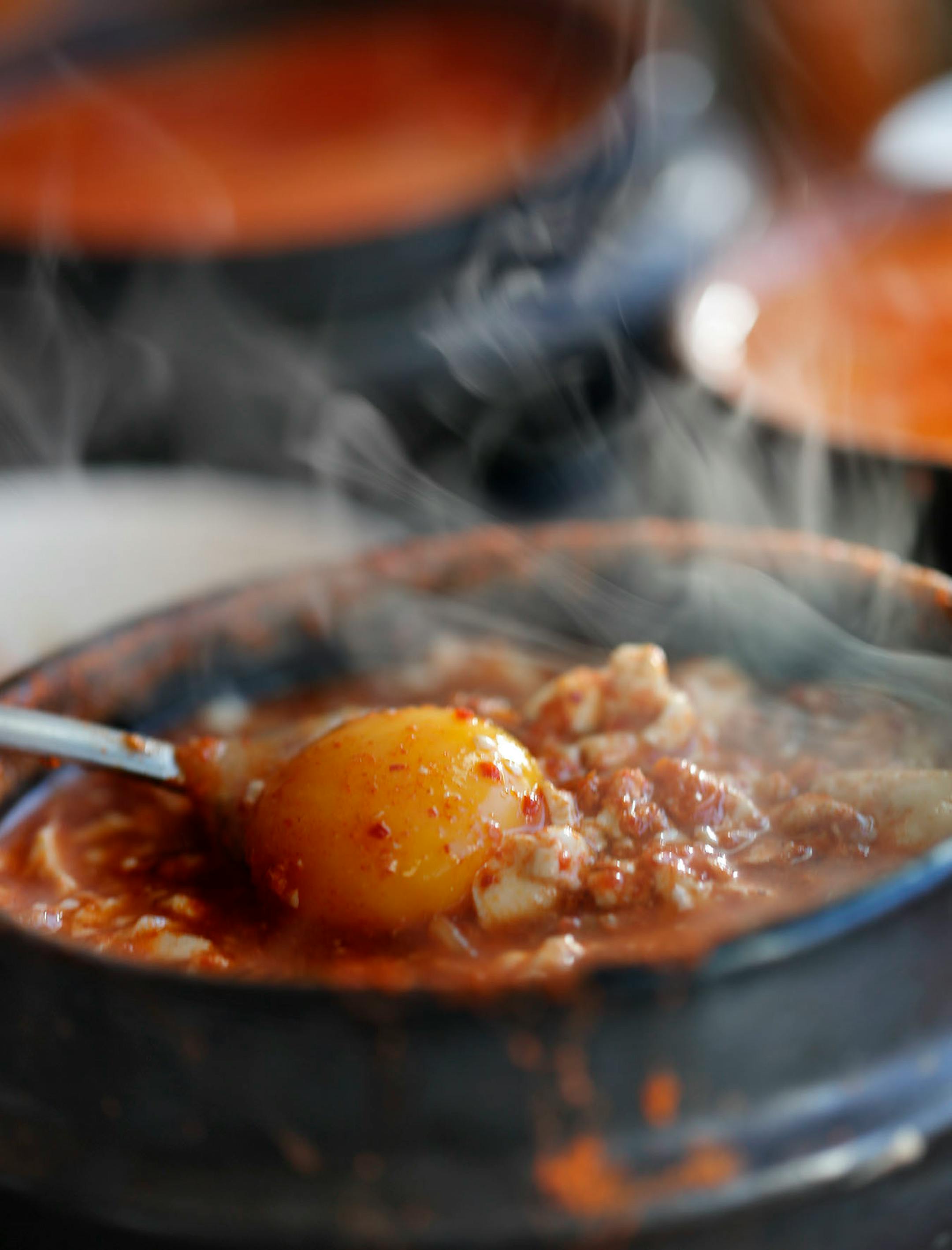 Sundubu stew at, Kimchi Tofu House, near the U of M in Minneapolis, specializes in spicy Korean soup called sundubu. It sells 12 varieties and customers can choose the level of spiciness, done by varying the amount of Korean chili flakes called gochugaru. ] Star Tribune/Tom Wallace • tom.wallace@startribune.com
