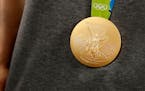 An Olympic Gold Medal worn by Maya Moore.
