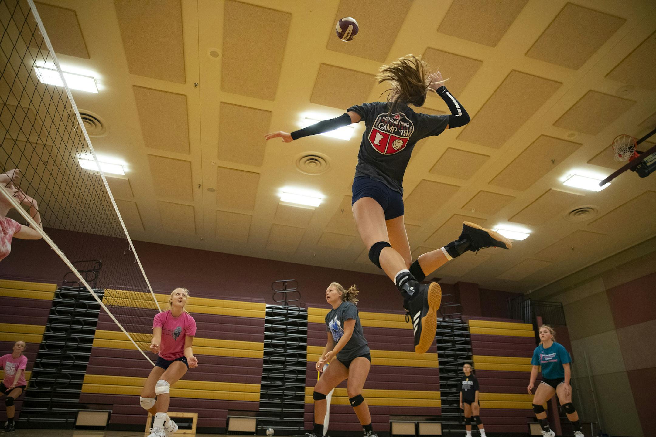 Duluth Denfeld's Jordan Mitchell jumped up for a spike practice on Aug. 4, before the team's season was postponed until spring. The Minnesota State High School League voted Monday to restart volleyball next Monday.