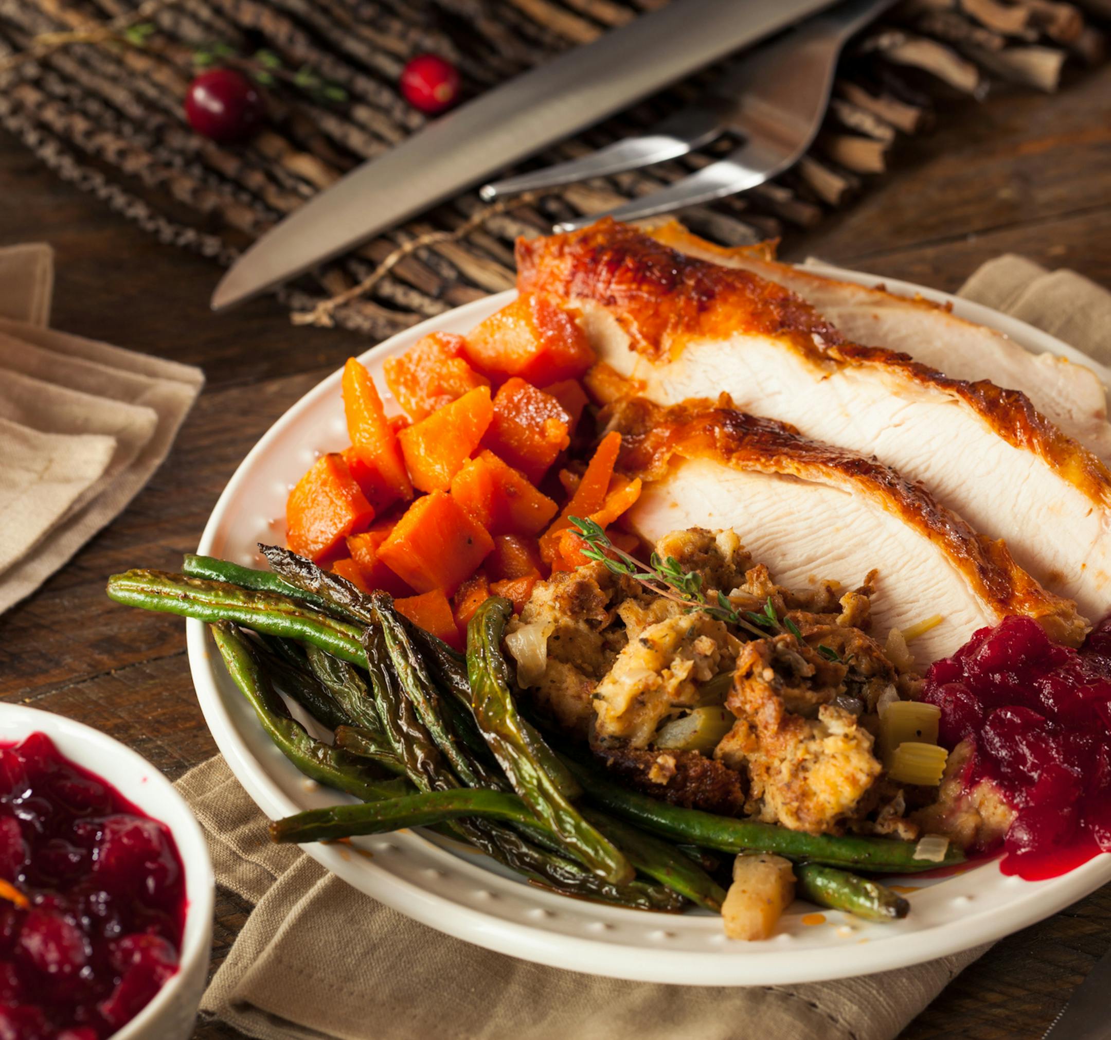 Full Homemade Thanksgiving Dinner with Turkey Stuffing Veggies and Potatos