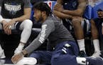 Newly signed Wolves guard Derrick Rose sat on the floor but didn't get onto the floor for a minute of playing time in his first game with the Wolves, 