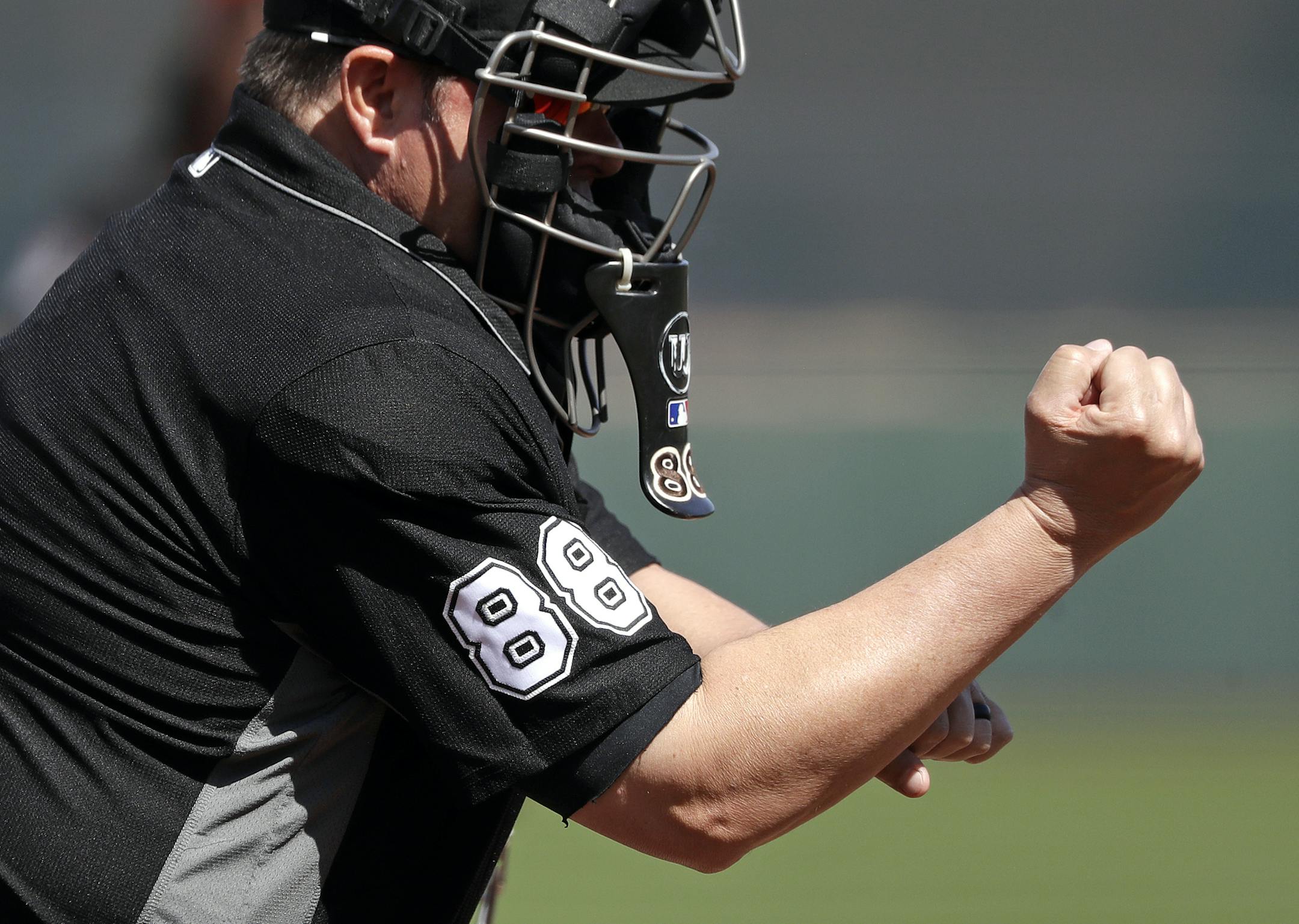 Umpire Doug Eddings calls a strike during a spring training baseball game between the San Francisco Giants and Los Angeles Dodgers Monday, March 4, 2019, in Scottsdale, Ariz. (AP Photo/Elaine Thompson) ORG XMIT: OTK