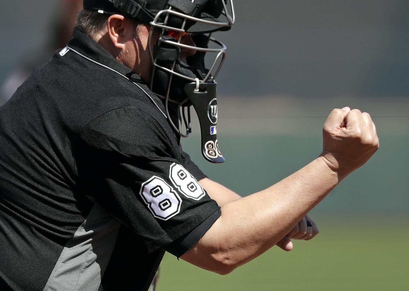 Umpire Doug Eddings calls a strike during a spring training baseball game between the San Francisco Giants and Los Angeles Dodgers Monday, March 4, 2019, in Scottsdale, Ariz. (AP Photo/Elaine Thompson) ORG XMIT: OTK