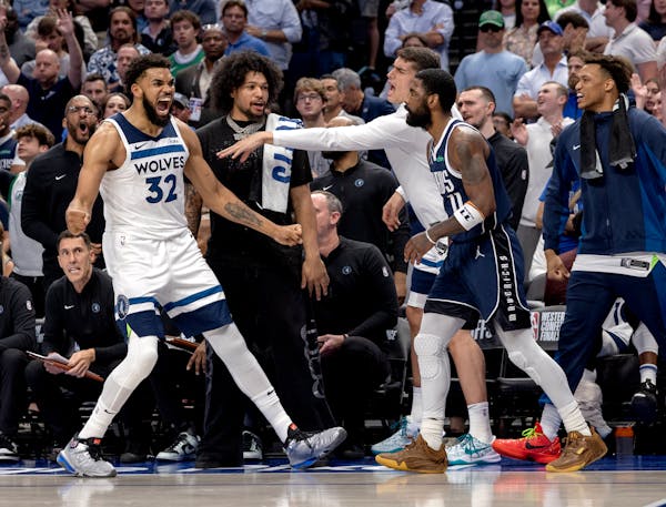 Timberwolves forward Karl Anthony Towns reacts after making a three-pointer in the fourth quarter of Game 4 of the Western Conference finals.
