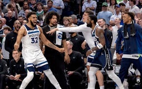 Karl Anthony Towns (32) of the Minnesota Timberwolves reacts after making a three pointer in the fourth quarter of Game 4 of the NBA Western Conferenc