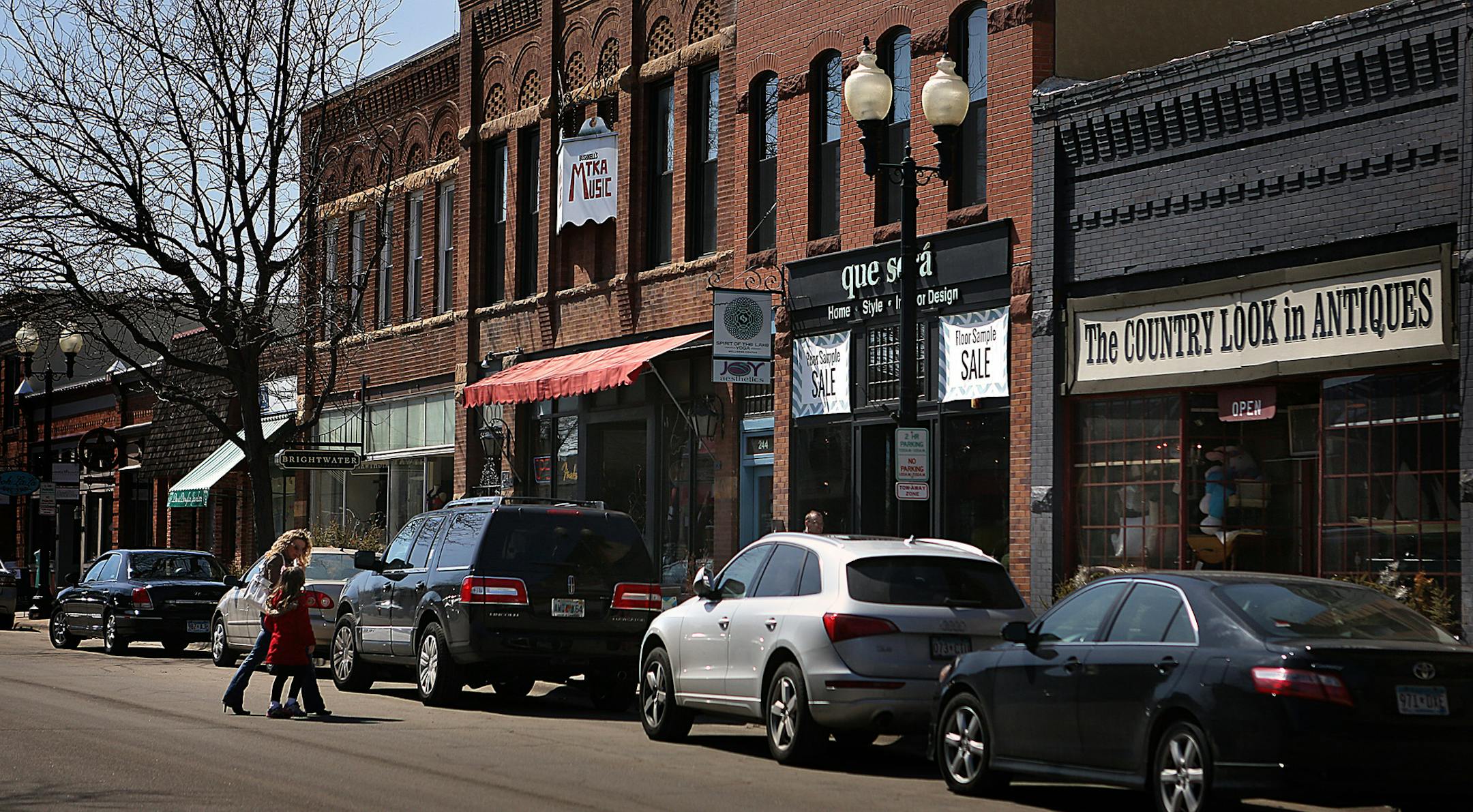 Water Street in Excelsior is lined with shops, restaurants and other businesses. The proposed hotel project would be built at the end of Water Street nearest the lake. ] (JIM GEHRZ/STAR TRIBUNE) / April 4, 2013 / 2:00 PM Minneapolis, MN &#x201a;&#xc4;&#xec; BACKGROUND INFORMATION- The Lake Minnetonka town of Excelsior is in the midst of a controversy surrounding plans for a major hotel project that will attract more tourists. Several city commissioners have resigned in protest to the project, an