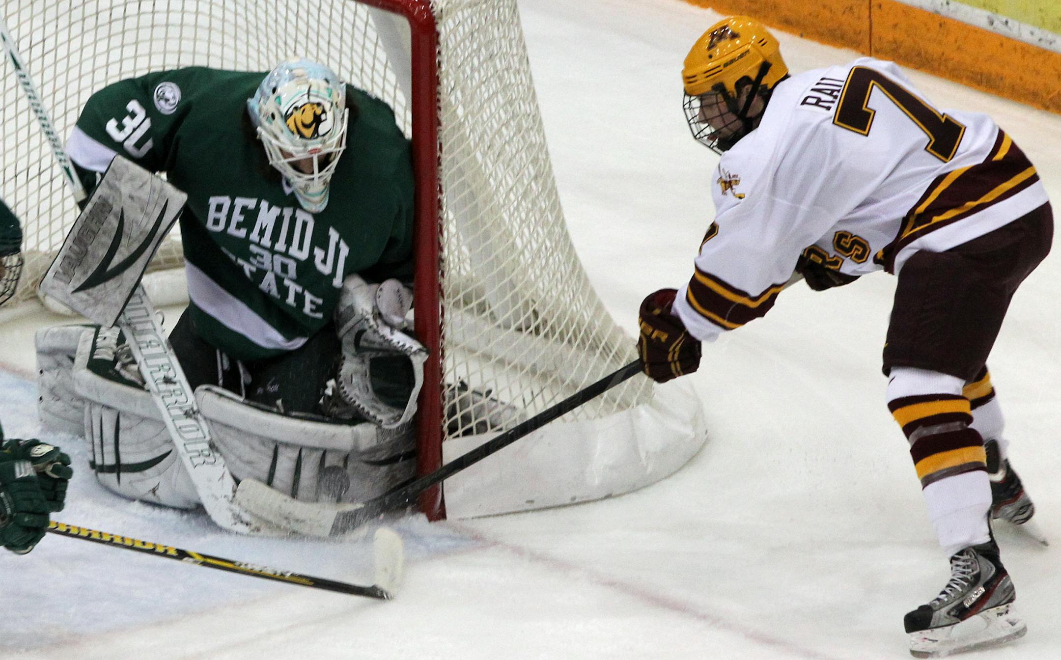 Kyle Rau, right, will be a Gophers captain in the 2013-14 season, along with Nate Condon