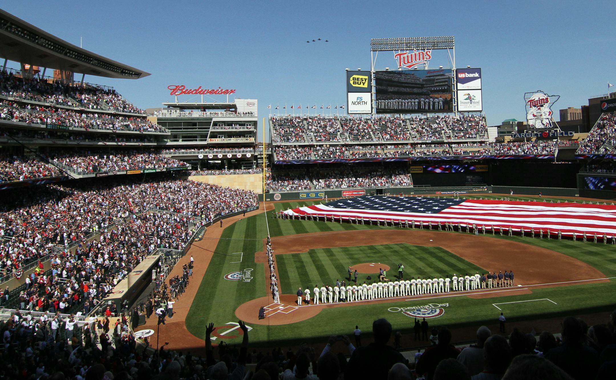 MCKENNA EWEN ¬∑ mckenna.ewen@startribune.com April 8, 2011 - Minneapolis, Minn. - Target Field Minnesota Twins vs. Oakland Athletics - In this photo: ]F16s fly over Target Field for opening day of the Minnesota Twins' 2011 season.