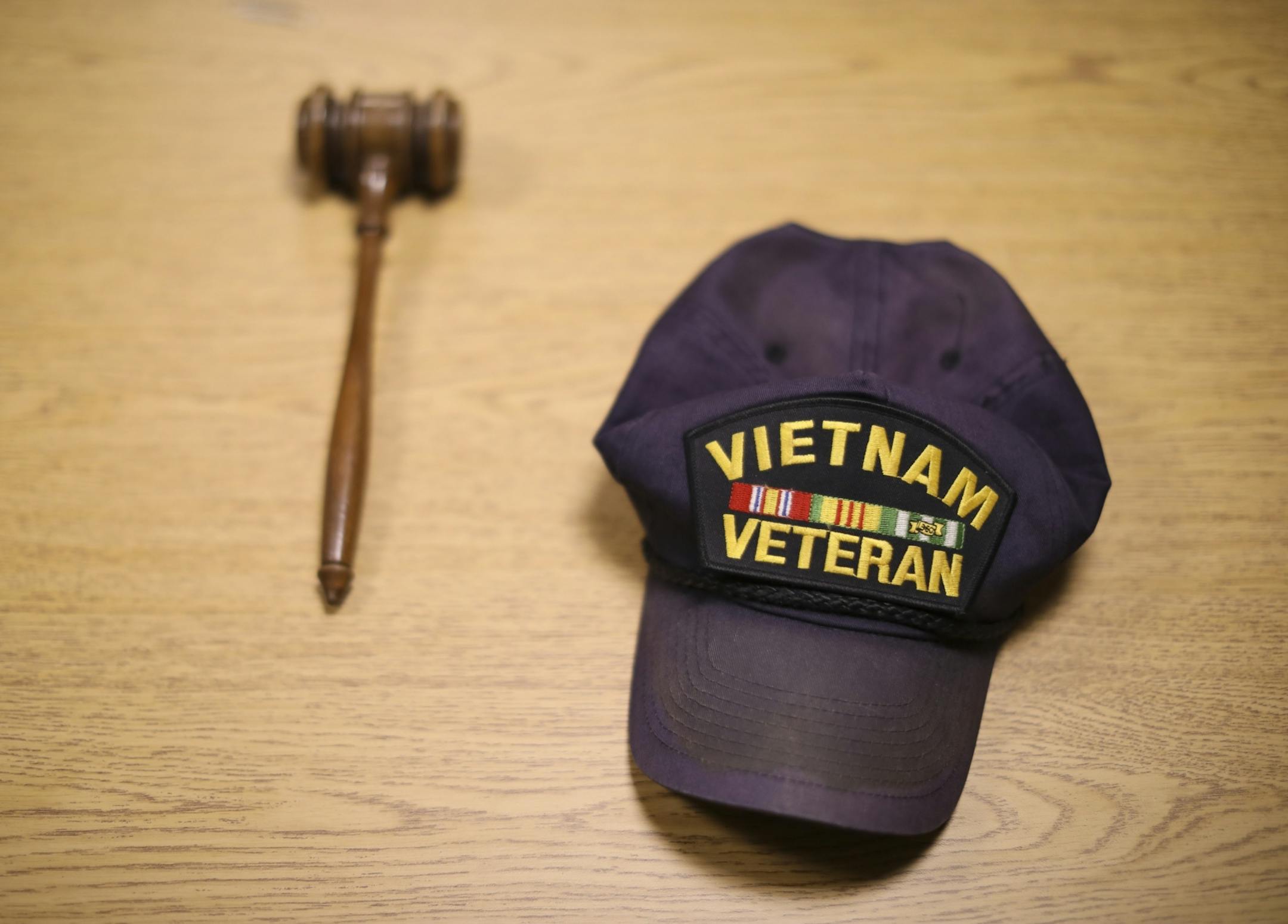 Moderator Tom Searing's cap and the gavel that he used while running Linwood Township's annual meeting Tuesday night.