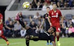 Los Angeles FC's Latif Blessing shoots on a bicycle kick against Toronto FC during the second half of their match Sept. 21 in Los Angeles. The teams p