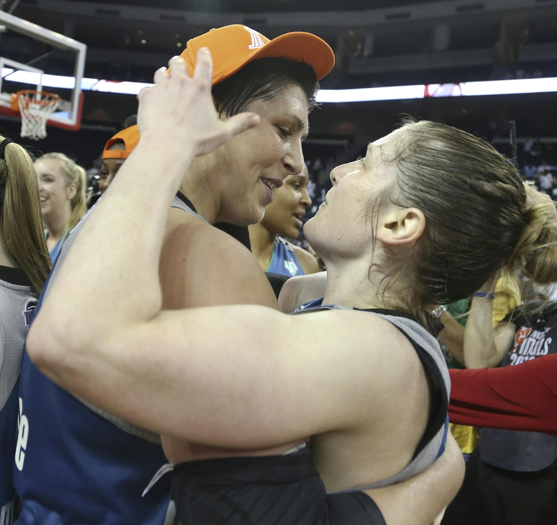 Janel McCarville (L) and Lindsey Moore of the Minnesota Lynx celebrate during the fourth quarter of Game 3 of the WNBA finals on Thursday, October 10, 2013, at the Gwinnett Center in Duluth, Ga. Minnesota won 86-77 to capture the championship.] RENEE JONES SCHNEIDER • reneejones@startribune.com